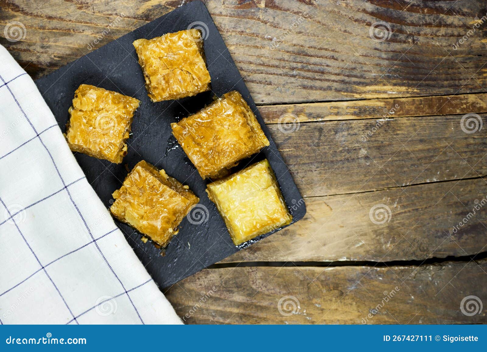 Pistachio Baklava Dessert On Wood Table Traditional Turkish Cuisine