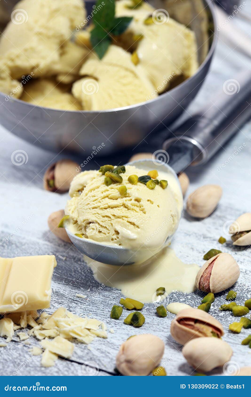 Pistachio Ice Cream Scoop with Chopped Nuts and White Chocolate Stock