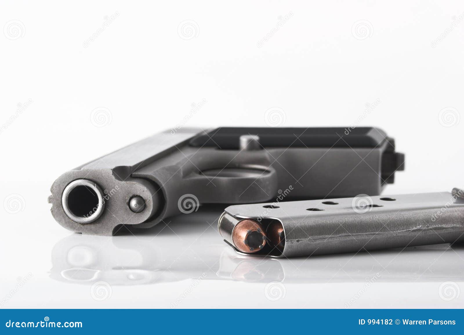 Pistol and clip stock photo. Image of magazines, firearms 994182