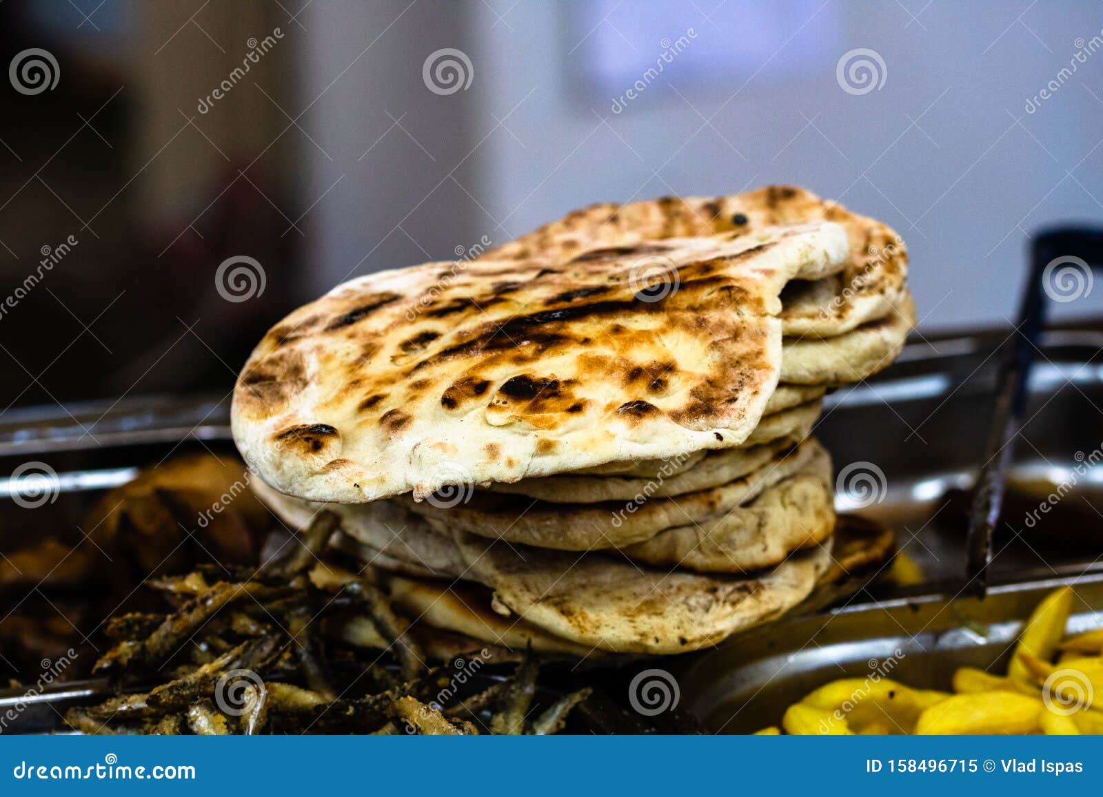 pita bread on the grill during fast food festival, street food