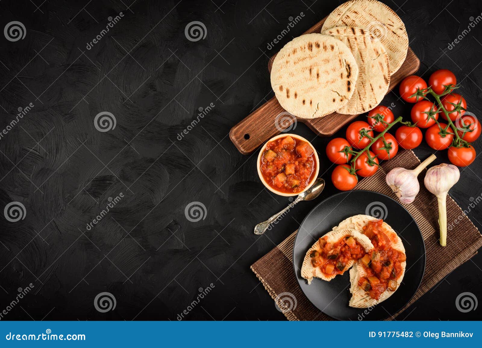 Pita Bread with Vegetable Spread Mediterranean Kitchen Style. Top View