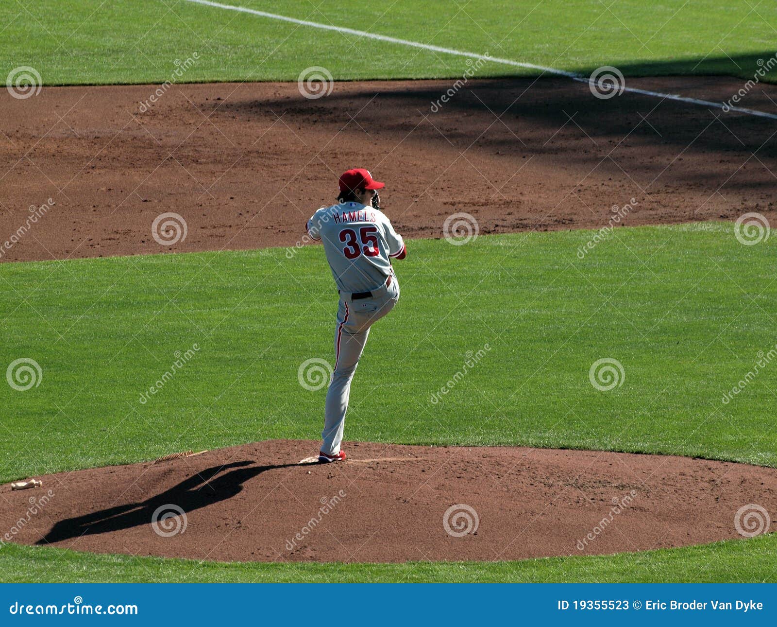 Pitcher Lifts Leg High As he Sets To Throw Pitch Editorial Stock Photo