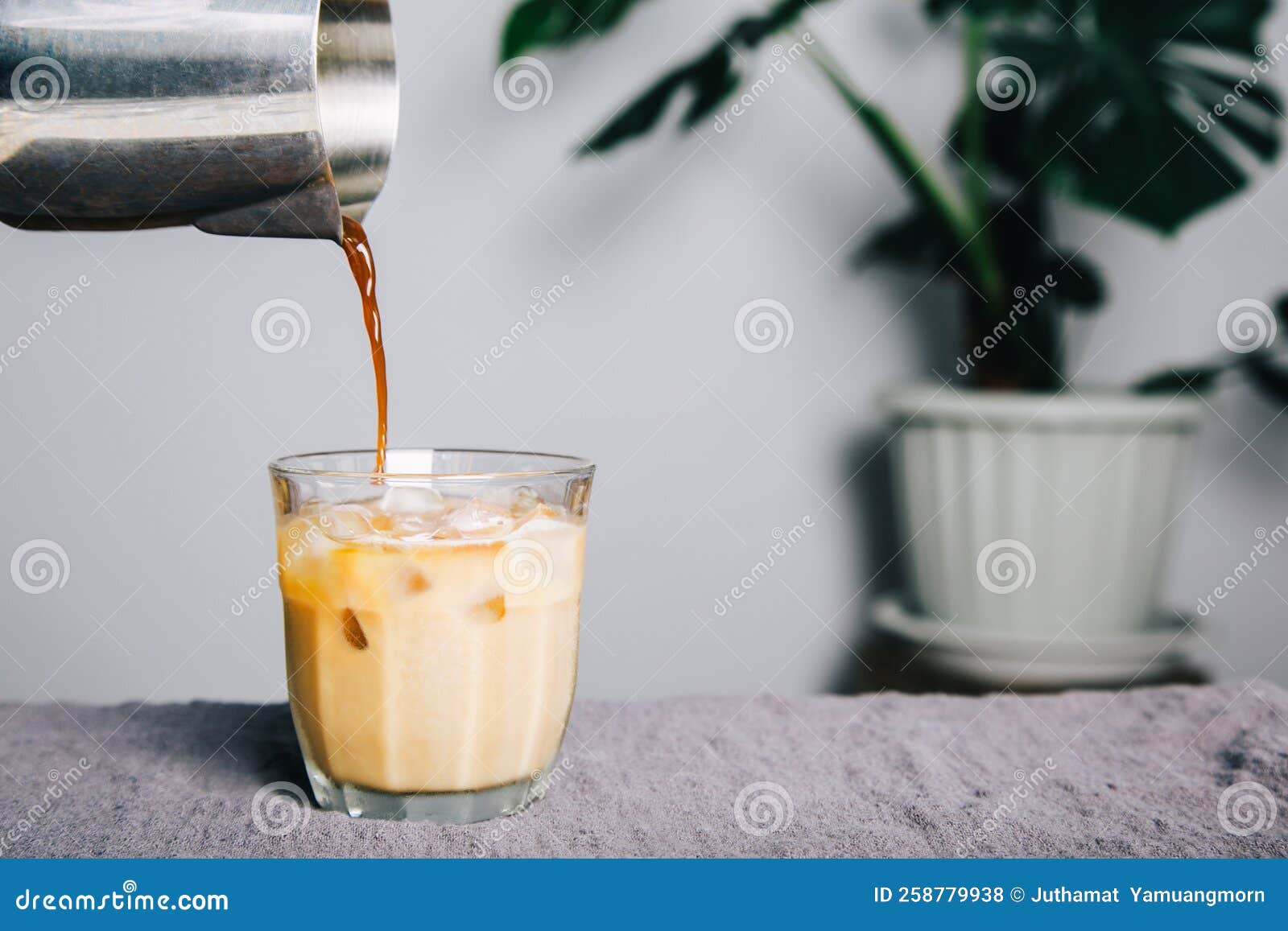Pitcher Pour Brewed Coffee Making Latte Coffee on Table and Coffee
