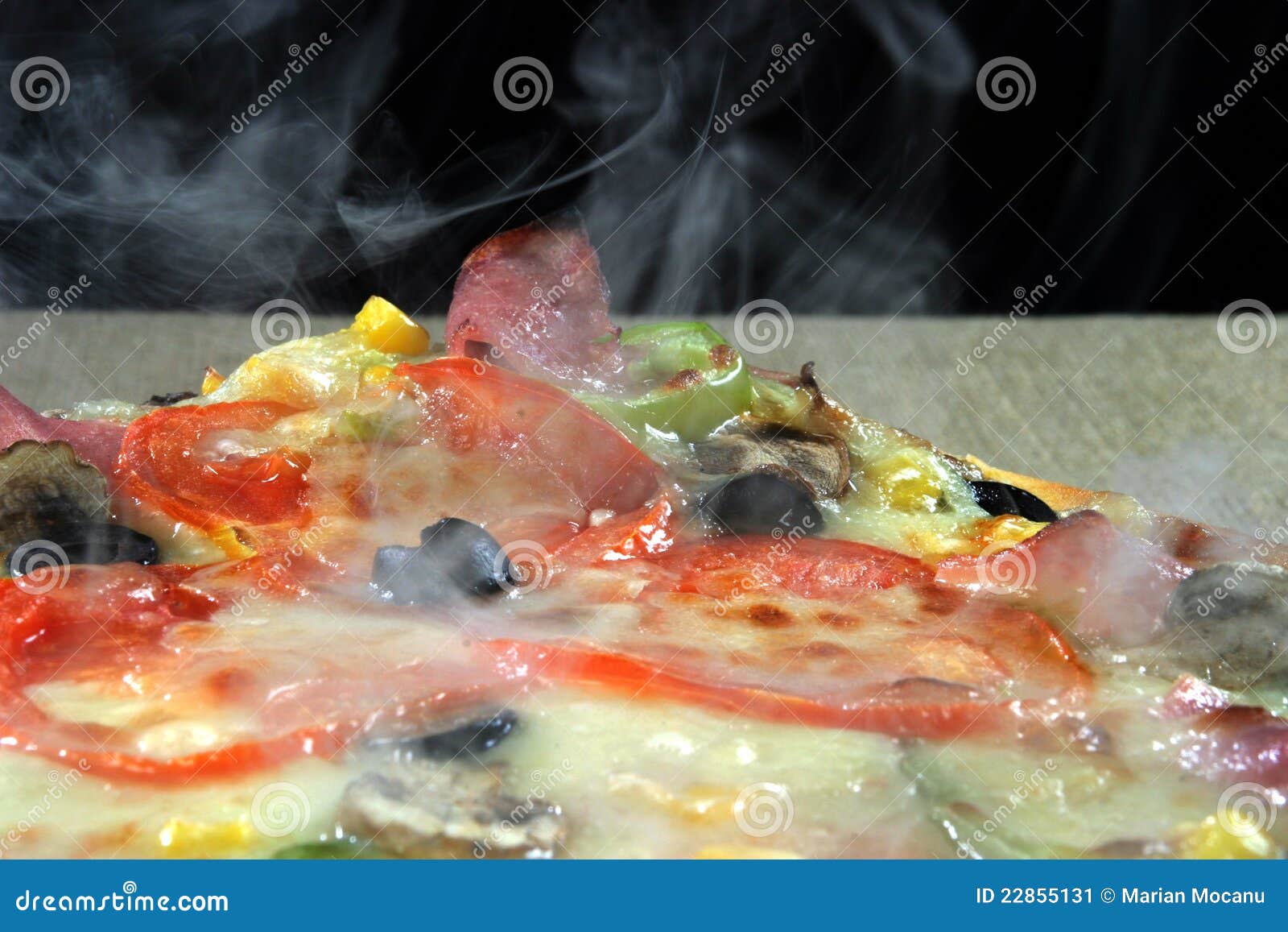 Delicious hot and fresh pizza with steam and smoke Stock Photo - Alamy