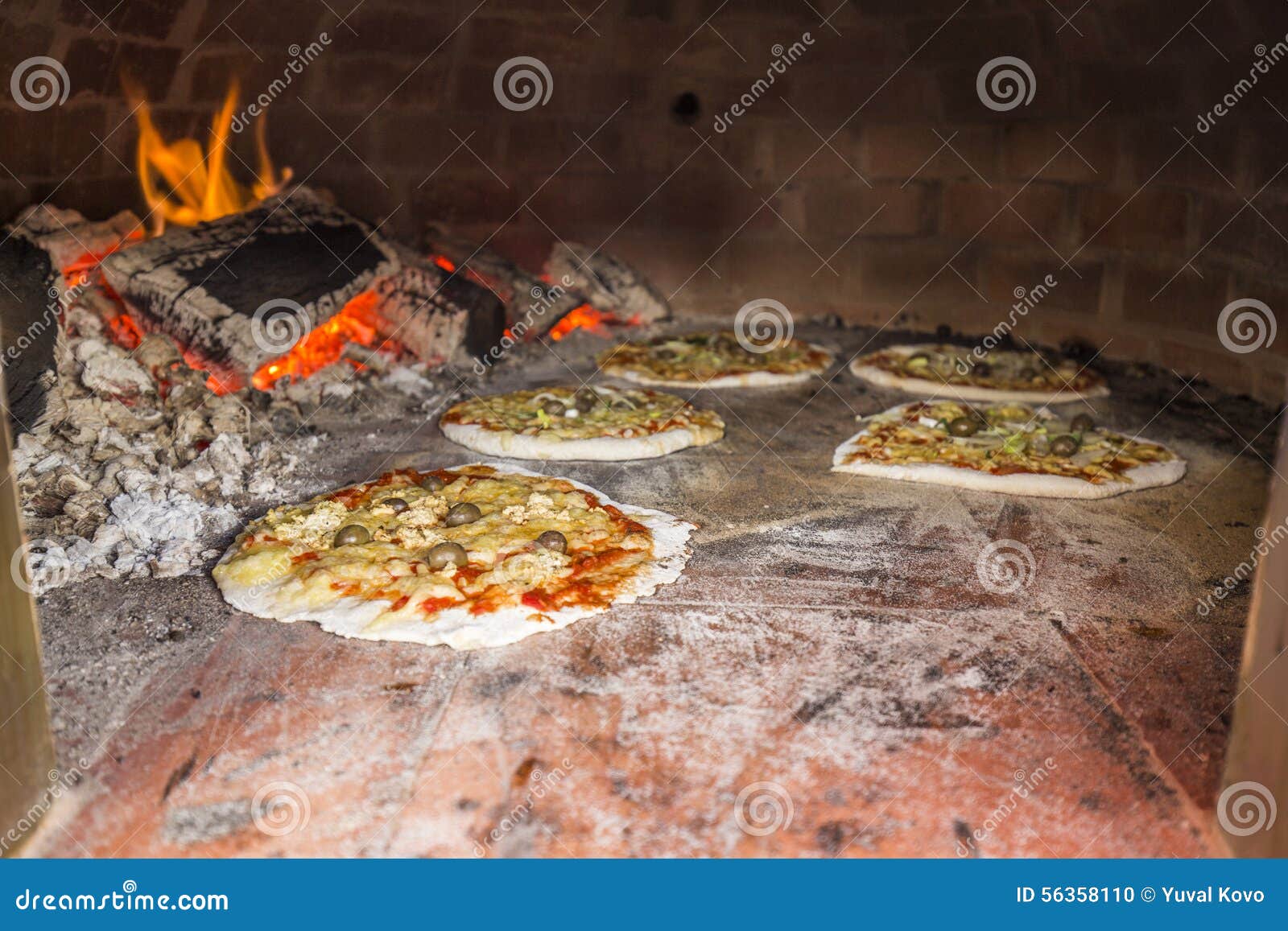 Pizza in a brick oven stock photo. Image of natural, pizza 56358110
