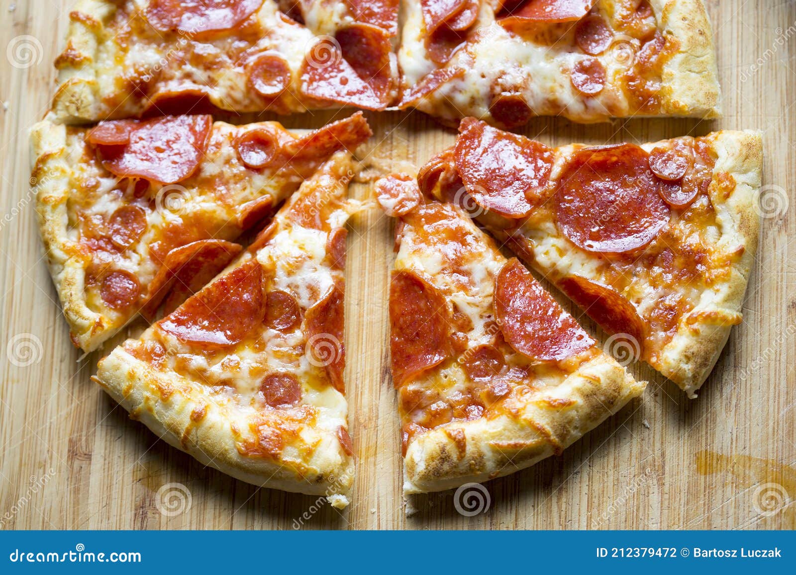 Pizza with Cheese, Pepperoni and Salami. Meat Feast Pizza Stock Photo