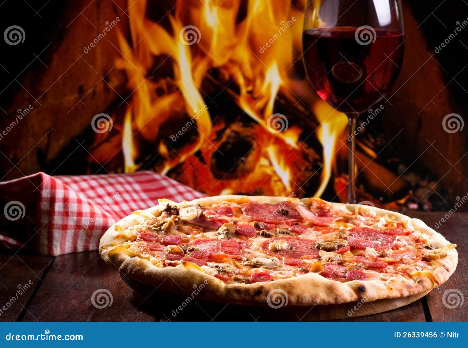 Pizza and glass of wine stock photo. Image of paprika 26339456