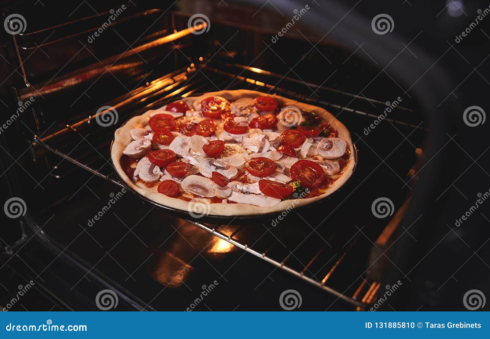 Pizza is Inside the Oven on the Iron Grill Stock Photo Image of black