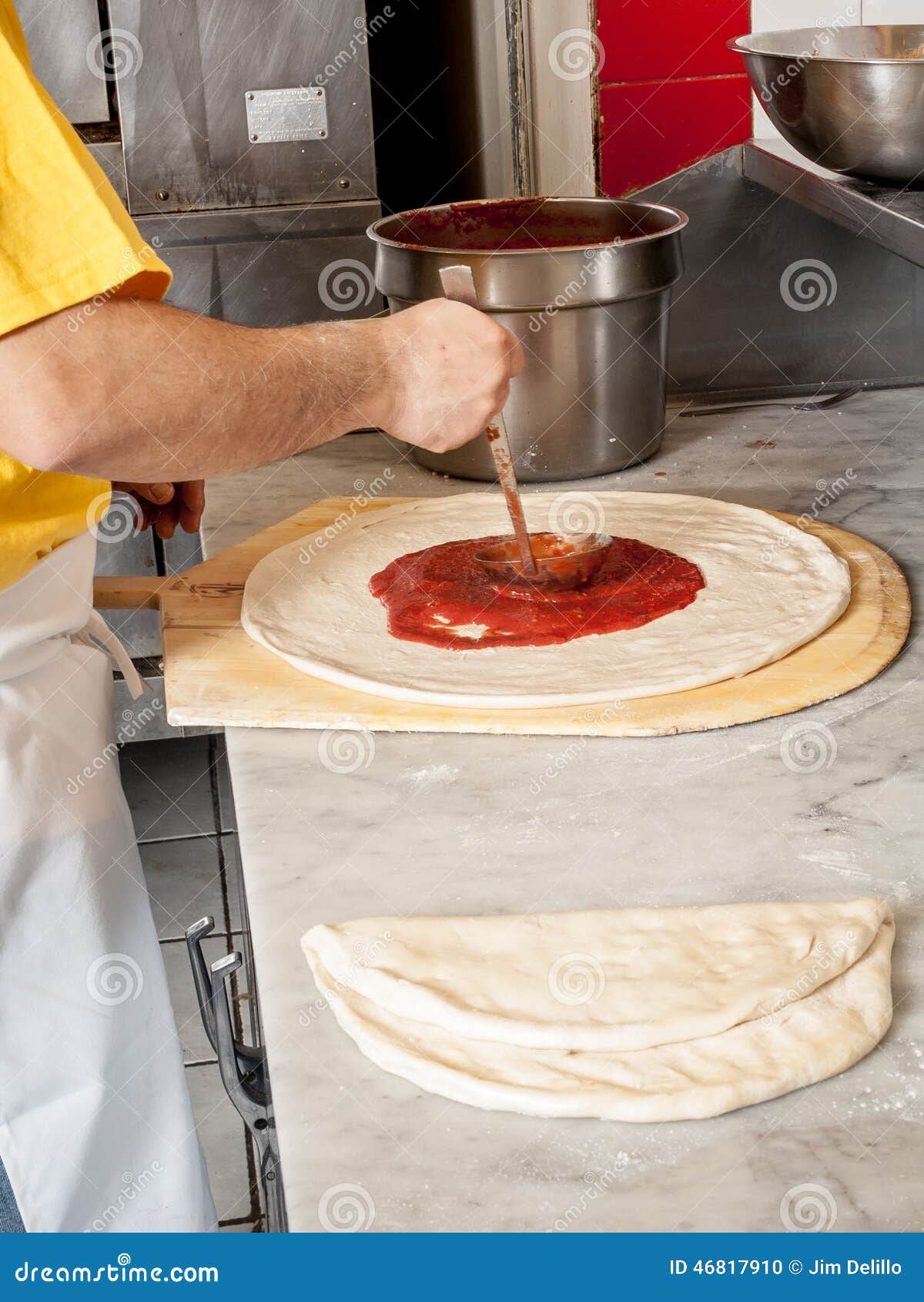 Pizza Maker Puts on the Sauce Stock Photo Image of health, delicious 46817910
