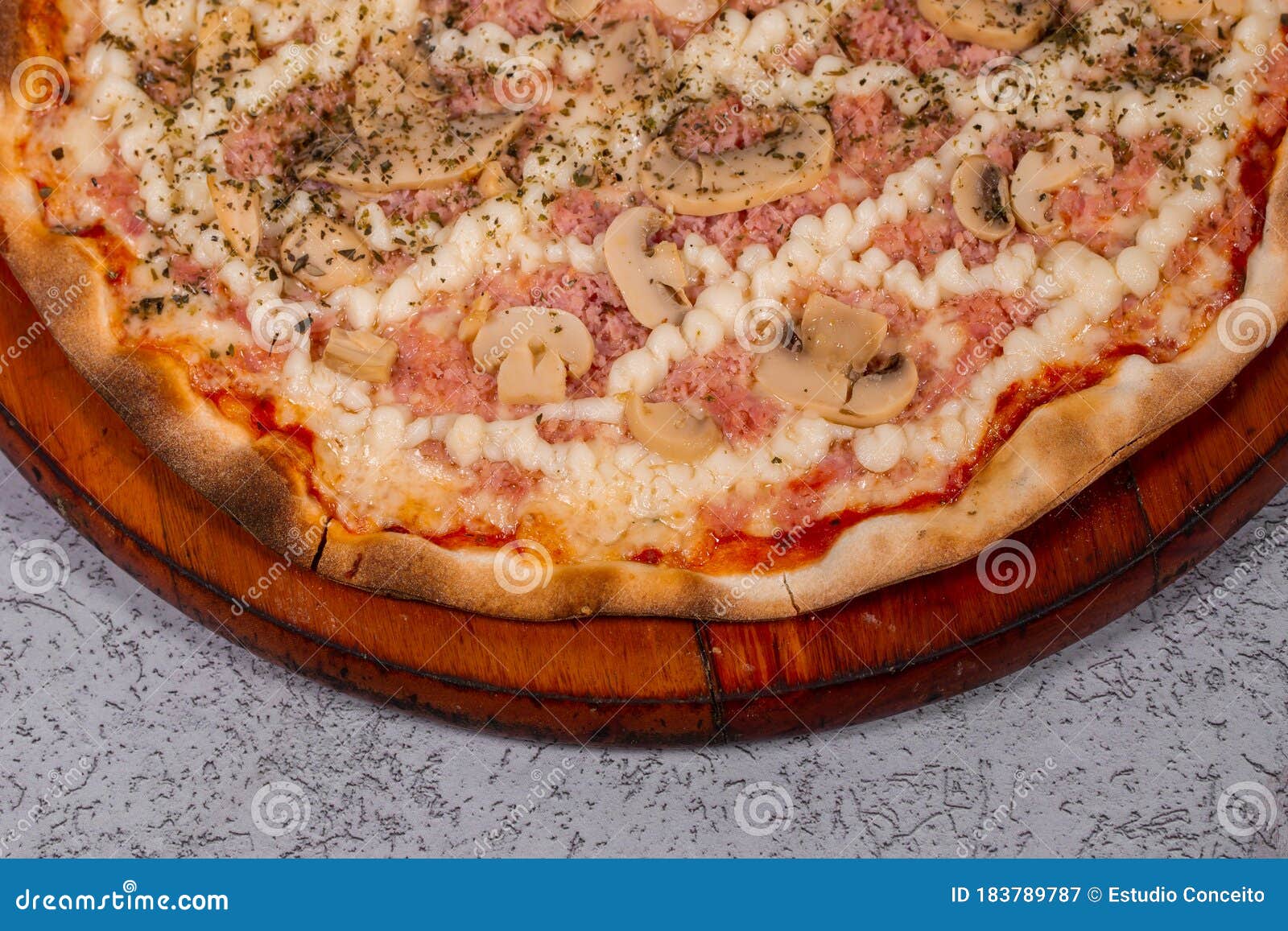 Pizza with Mushroom, Ham and Catupiry Cheese on Gray Background. Top