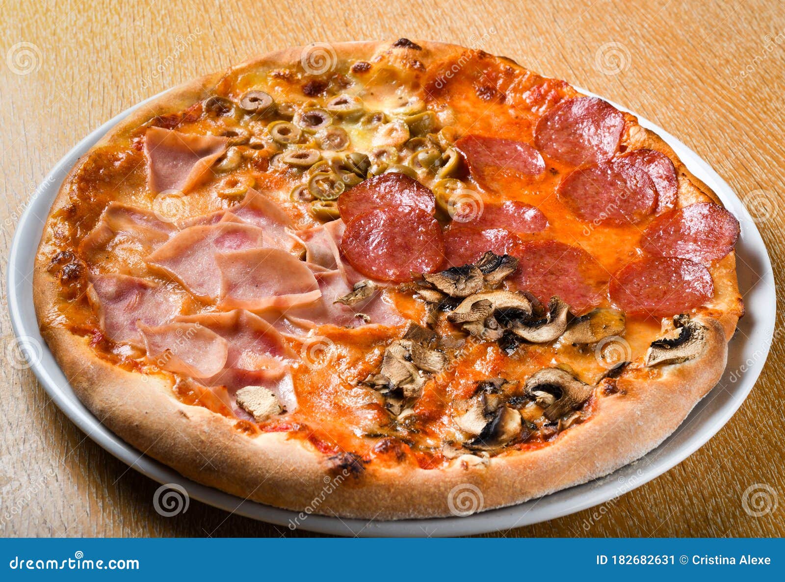 Pizza Quattro Stagioni is a Variety of Pizza in Italian Cuisine that is ...