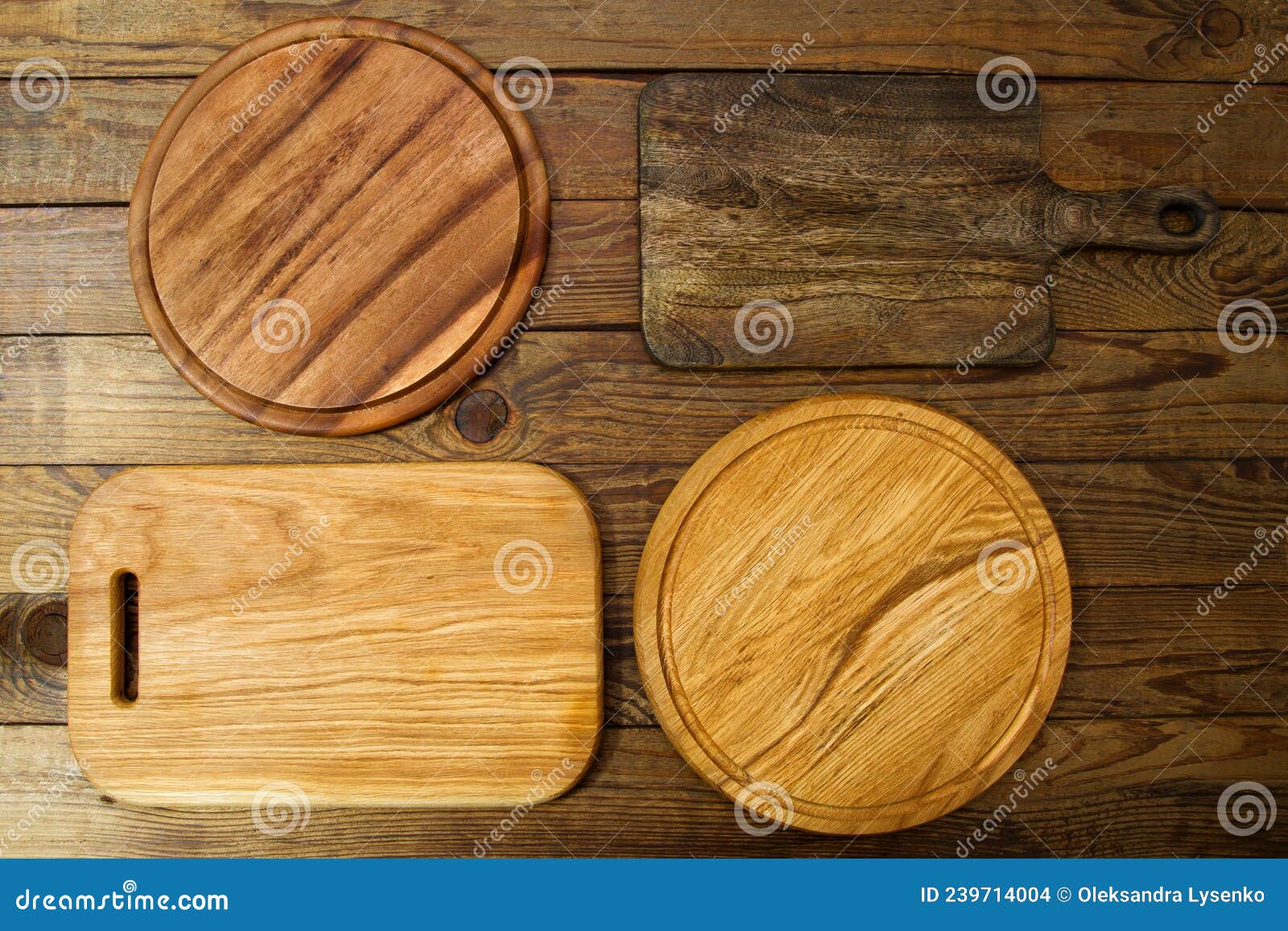 pizza round wood cutting board mockup top view. different types of kitchen boards on wooden background. copy space on workspace