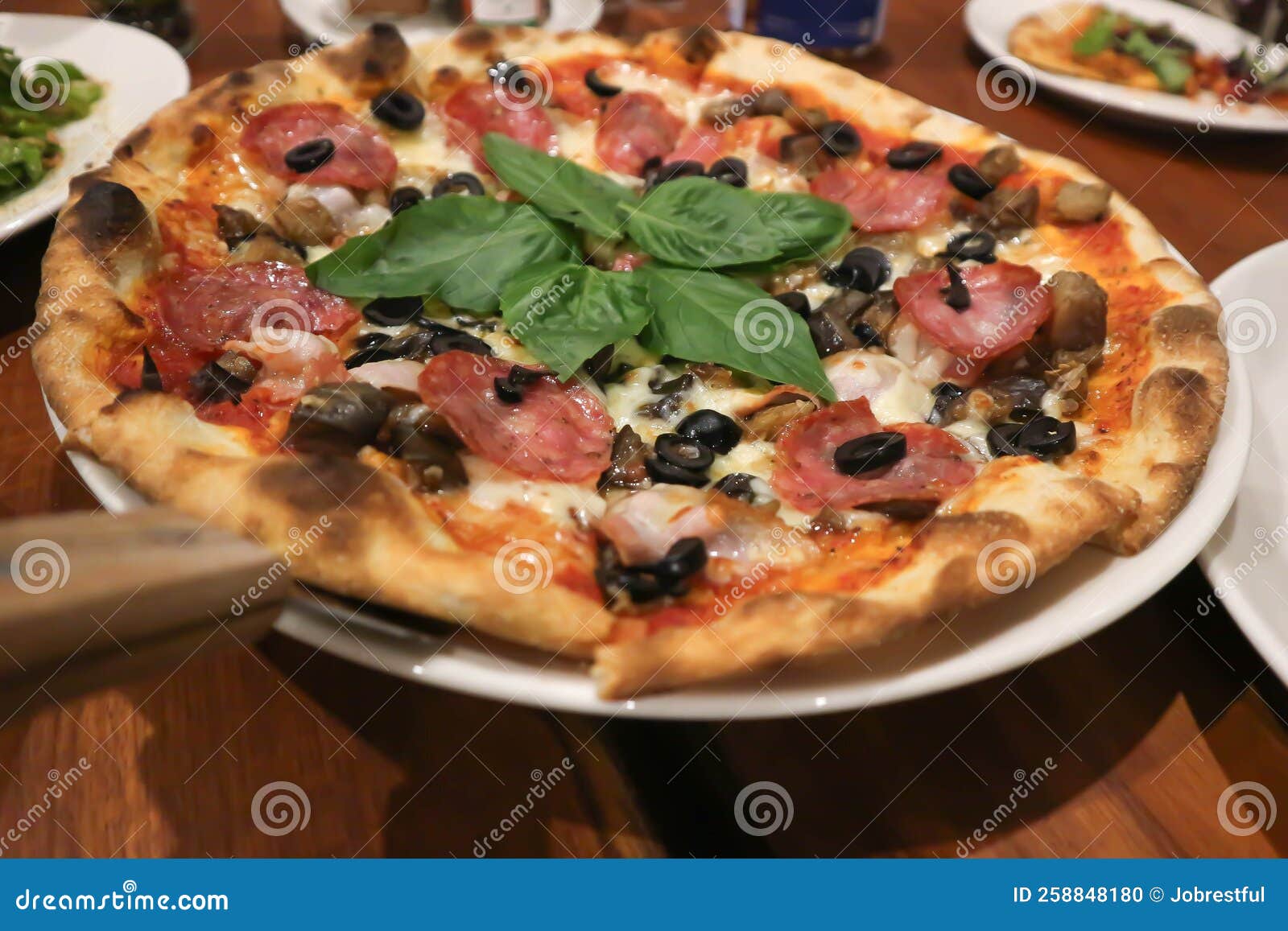 Pizza or Salami , Olive and Cheese Pizza with Vegetable Stock Photo
