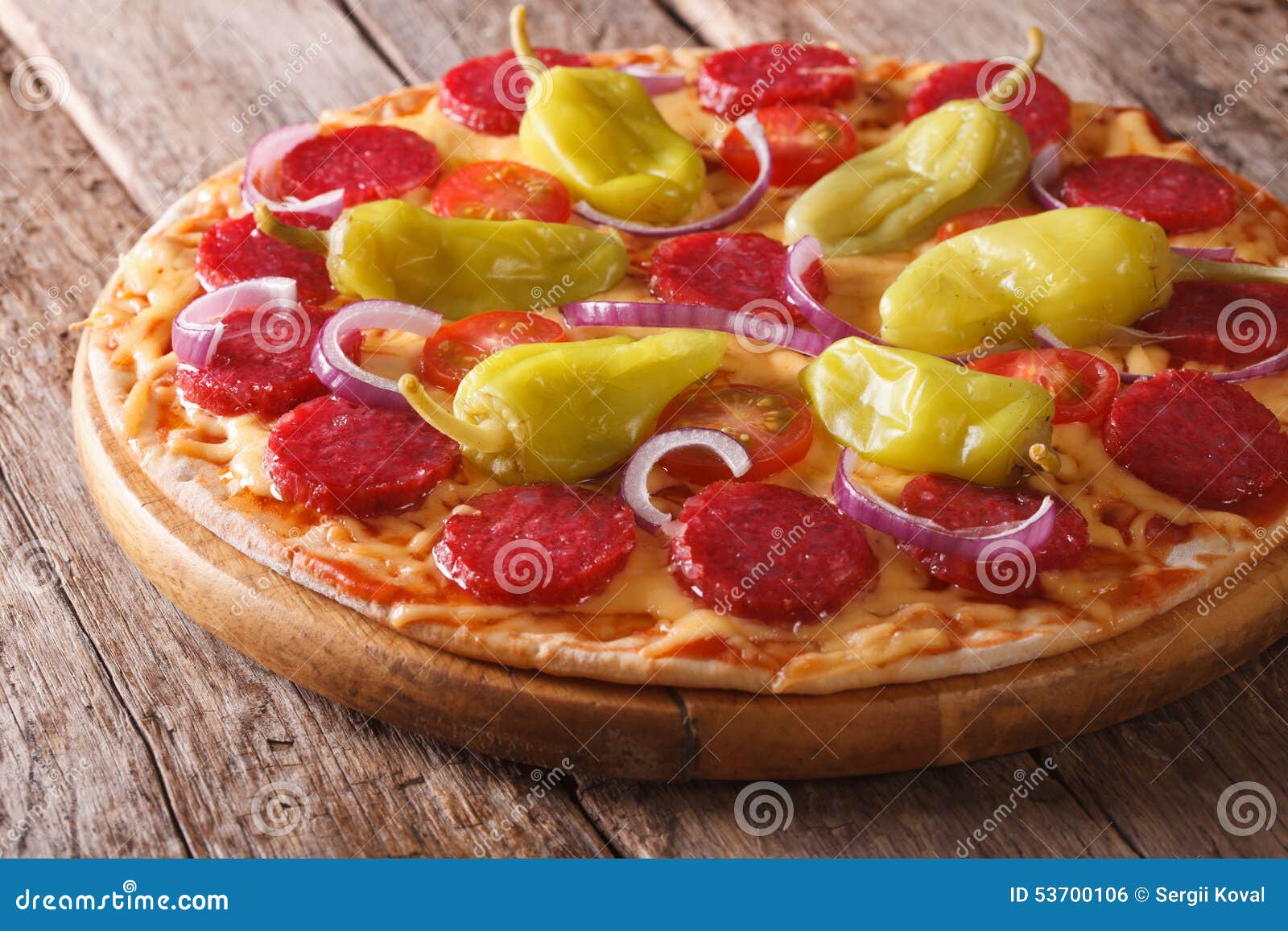 Pizza with Salami, Pepperoni Peppers on Table Horizontal Stock Photo