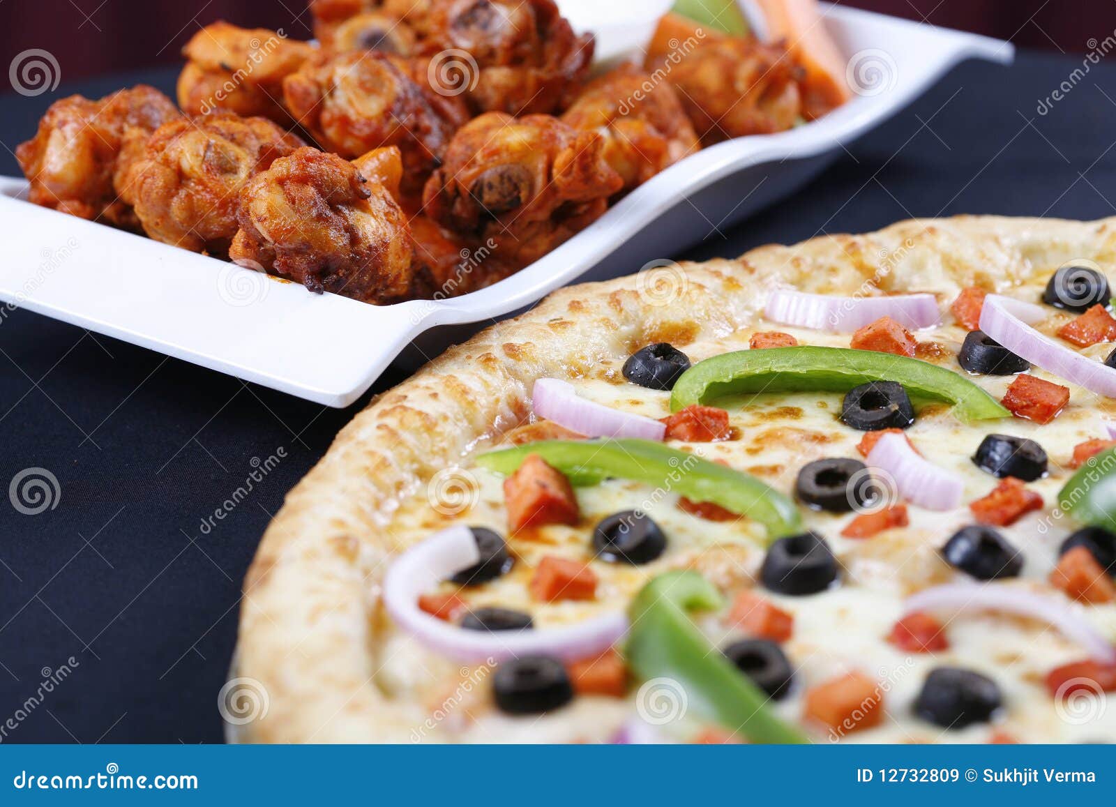 Pizza and wings stock image. Image of meal, cheese, dinner - 12732809