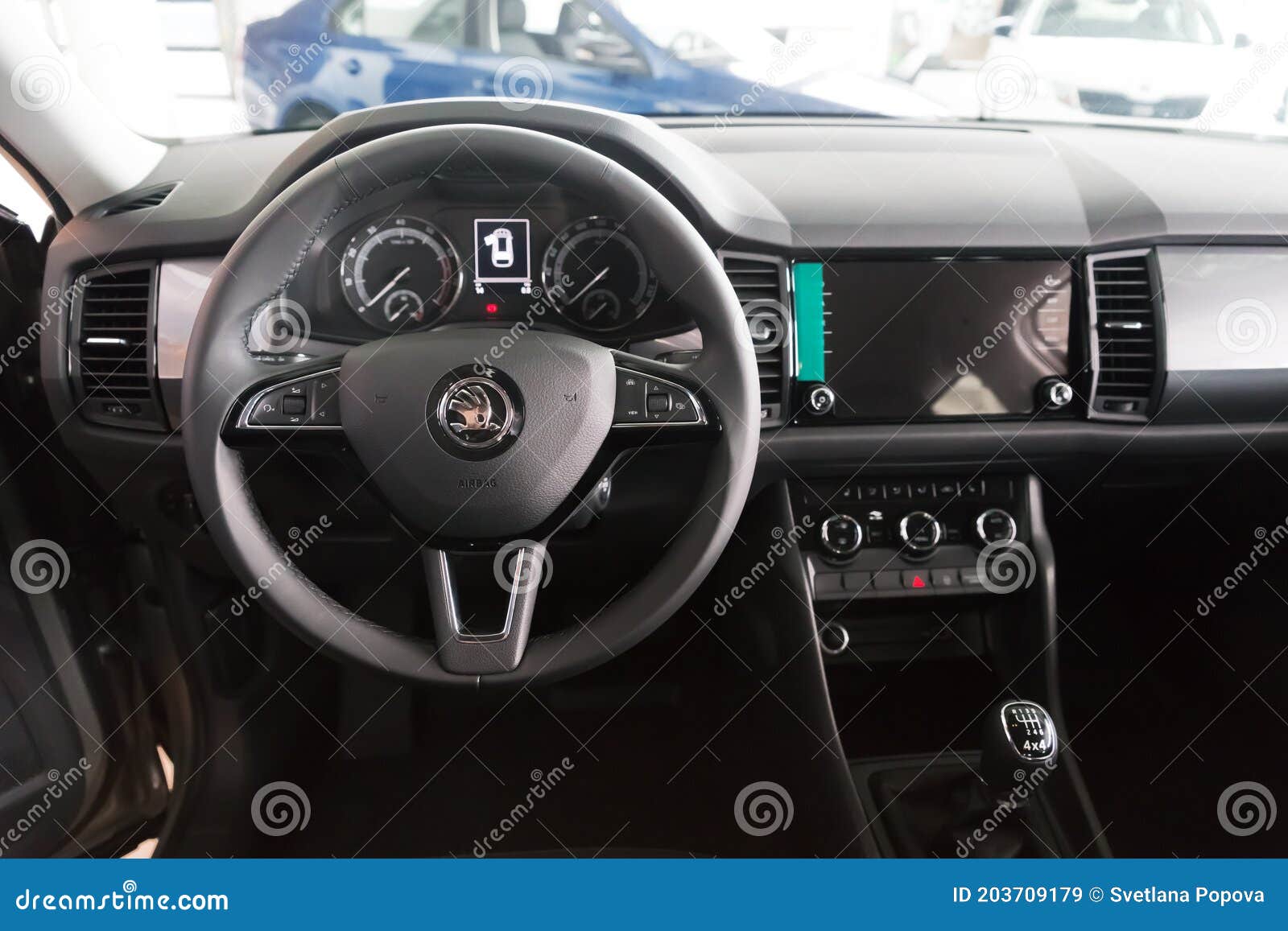 The Place of Driving a Car Inside the Cabin with a Steering Wheel and a