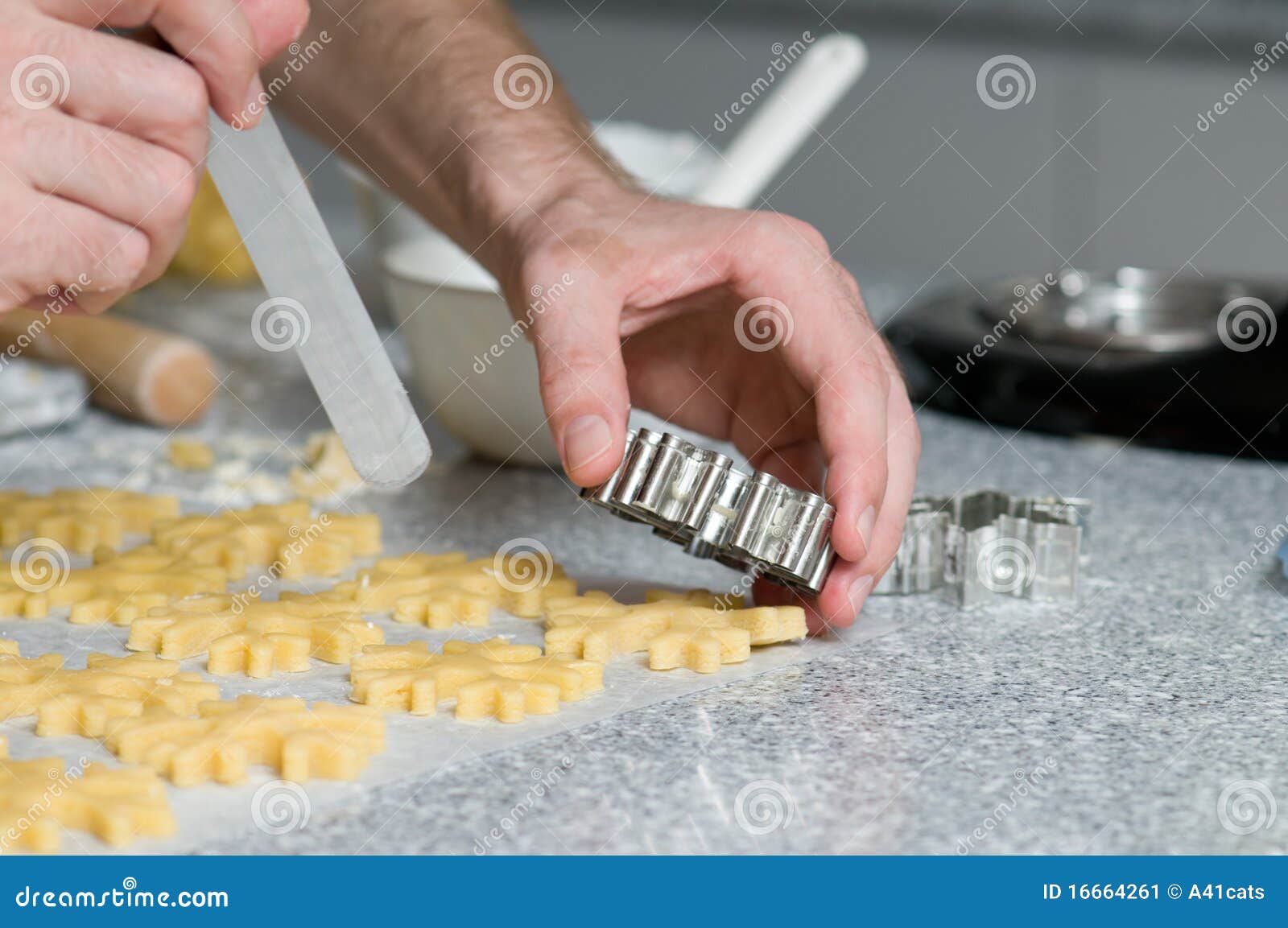 placing cookies after cutting on backing paper