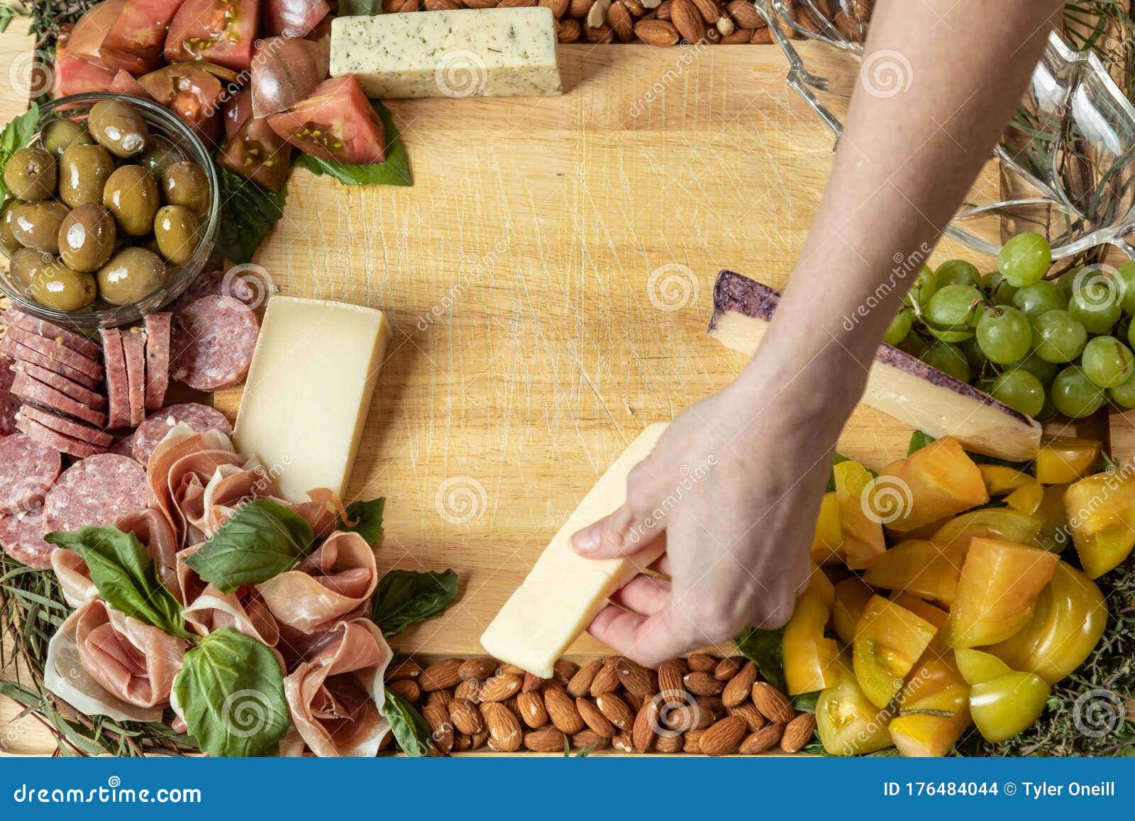 Placing Cheese on Charcuterie Board. Selective Focus Stock Photo Image of charcuterie, entree