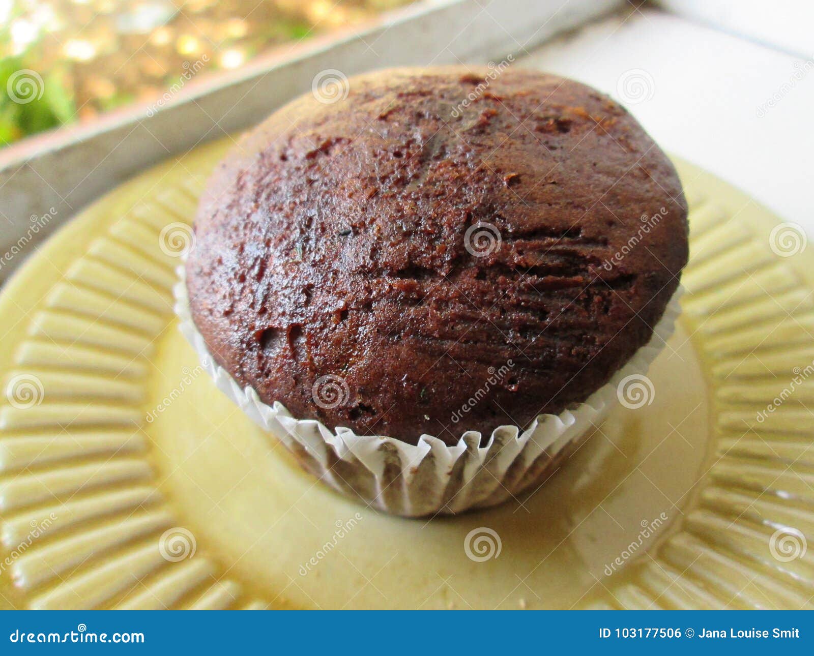 A Plain Brown Muffin in a Cup. Stock Photo Image of calories, baked