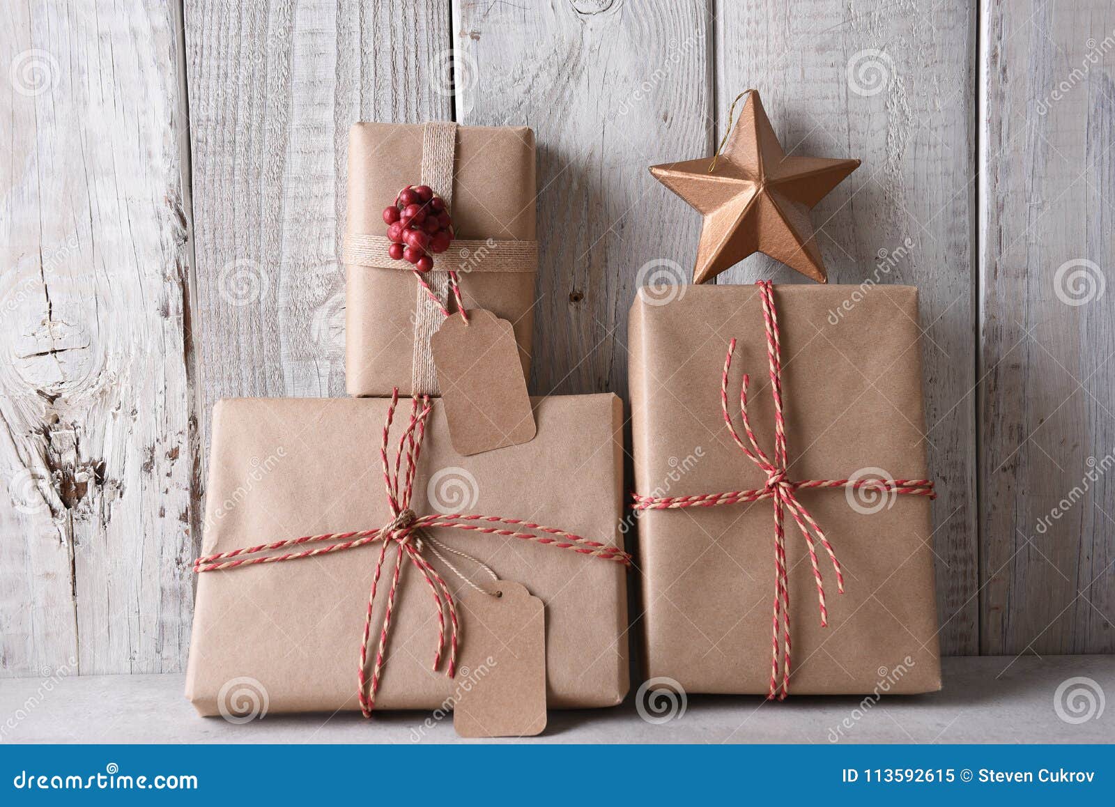 Plain Brown Paper Wrapped Christmas Presents Stock Image - Image of giving,  star: 113592615