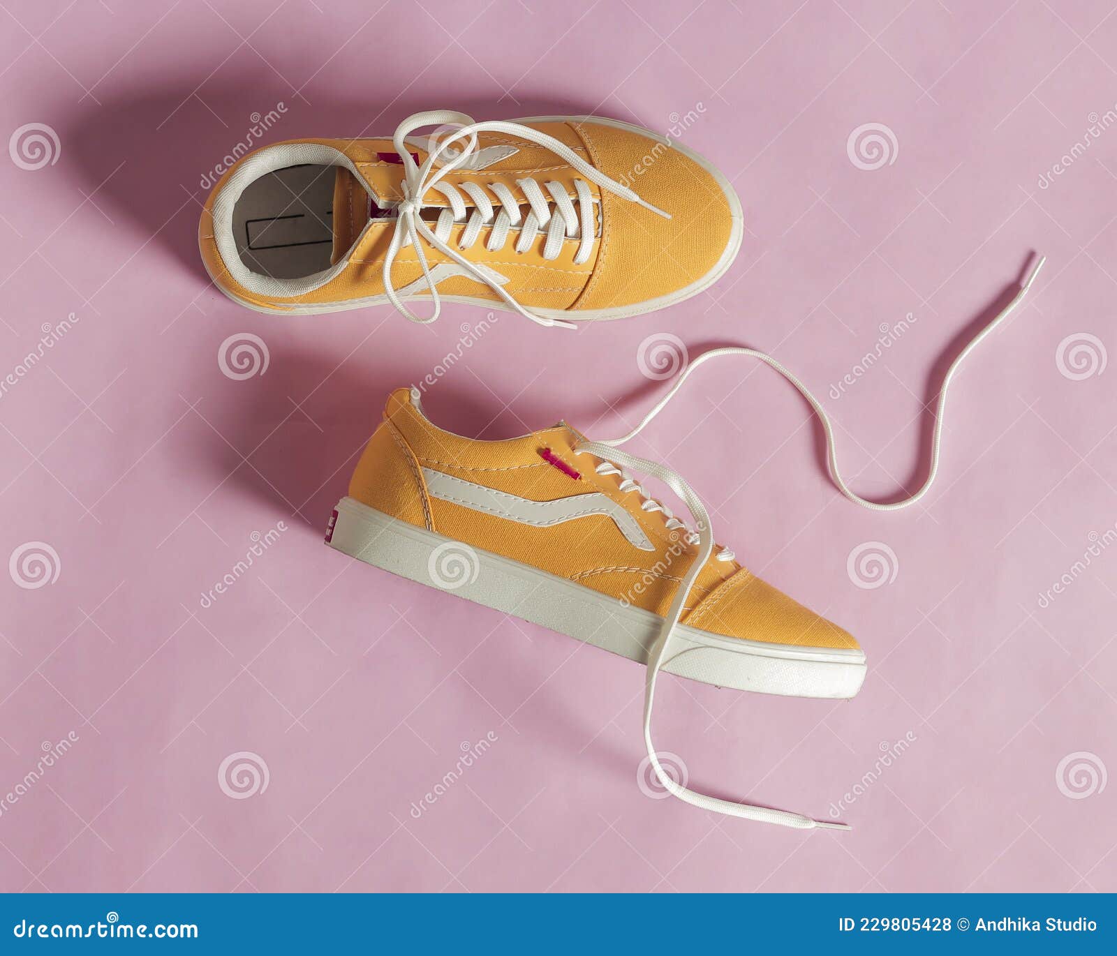 Yellow Converse Sneakers Isolated on Stock Photo - Image of comfortable, classic: 229805428
