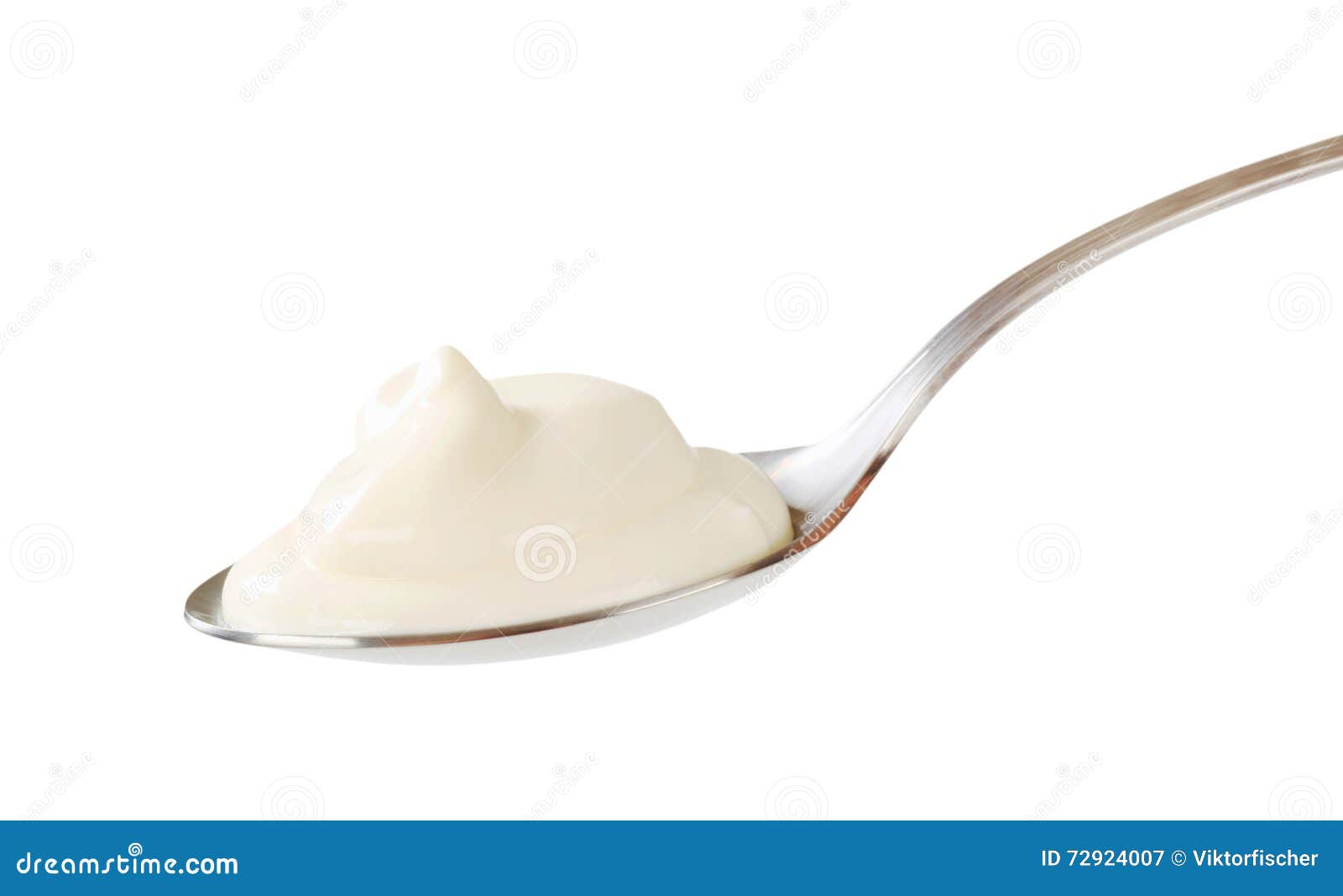 Plain yogurt on a spoon stock image. Image of nutrition 72924007