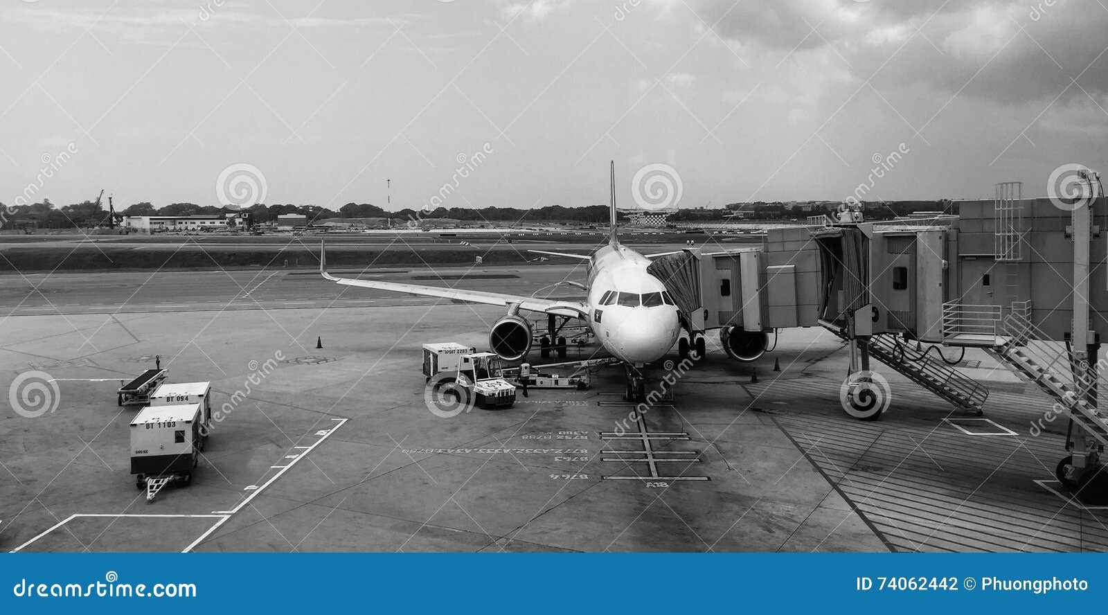 A Plane Docking at Changi Airport in Singapore Editorial Photography