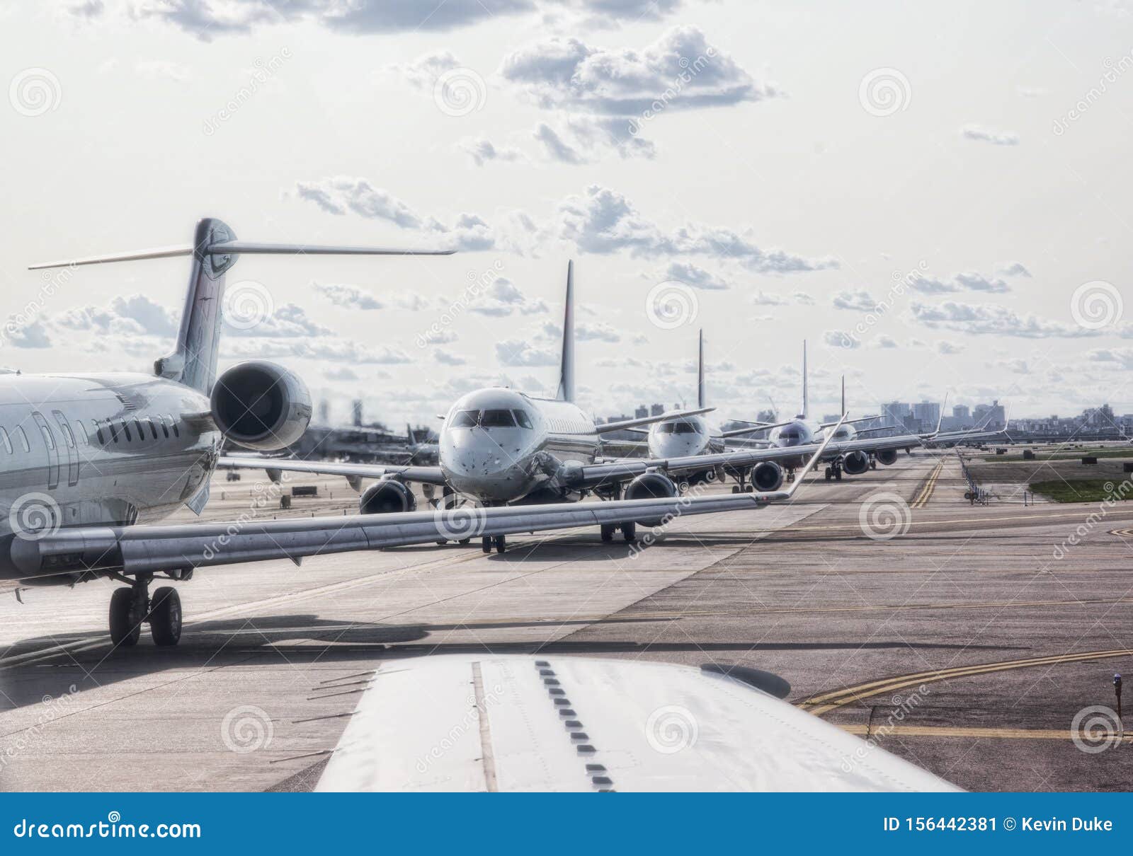commercial airliners waiting for takeoff 