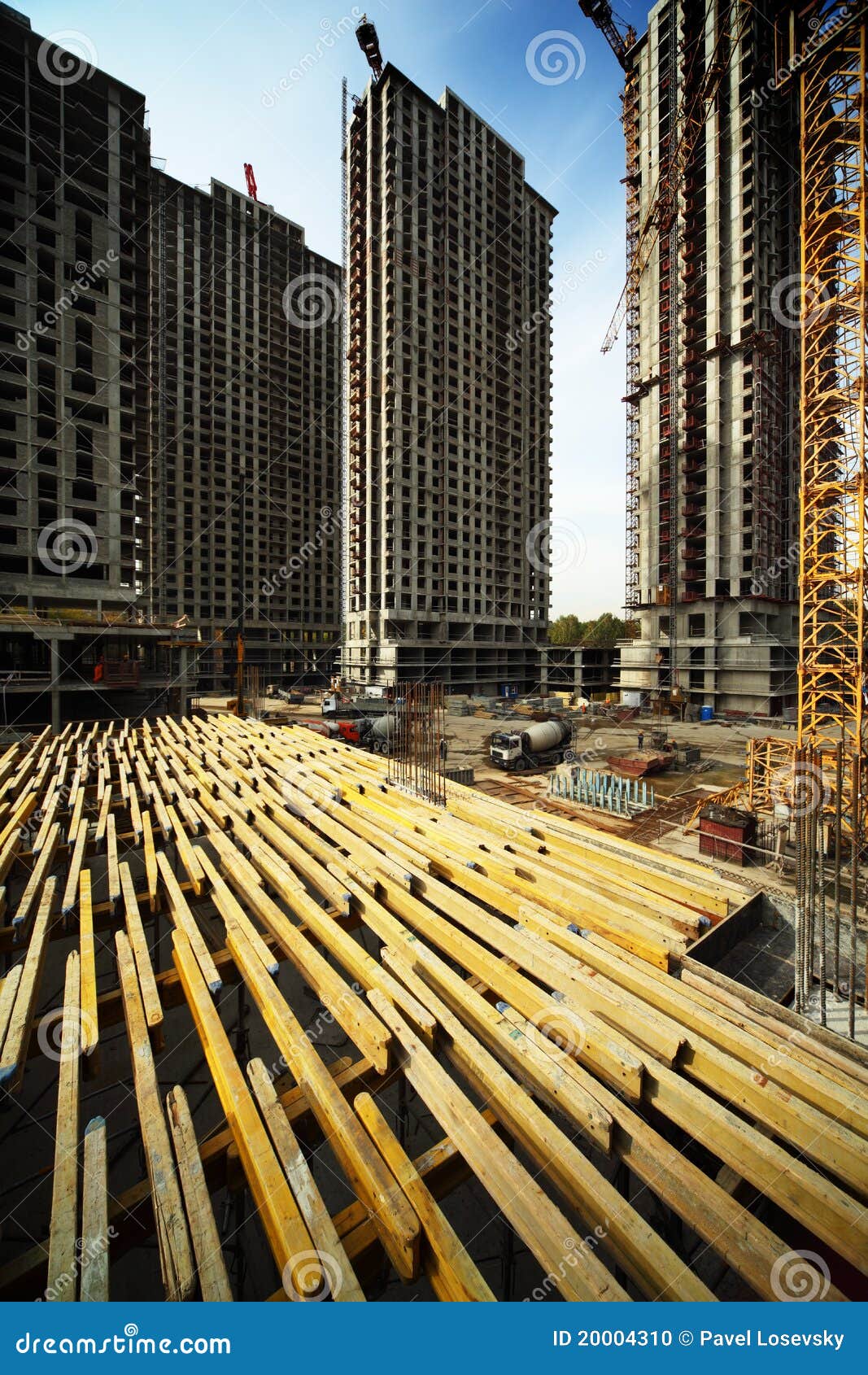 on planking between buildings under construction