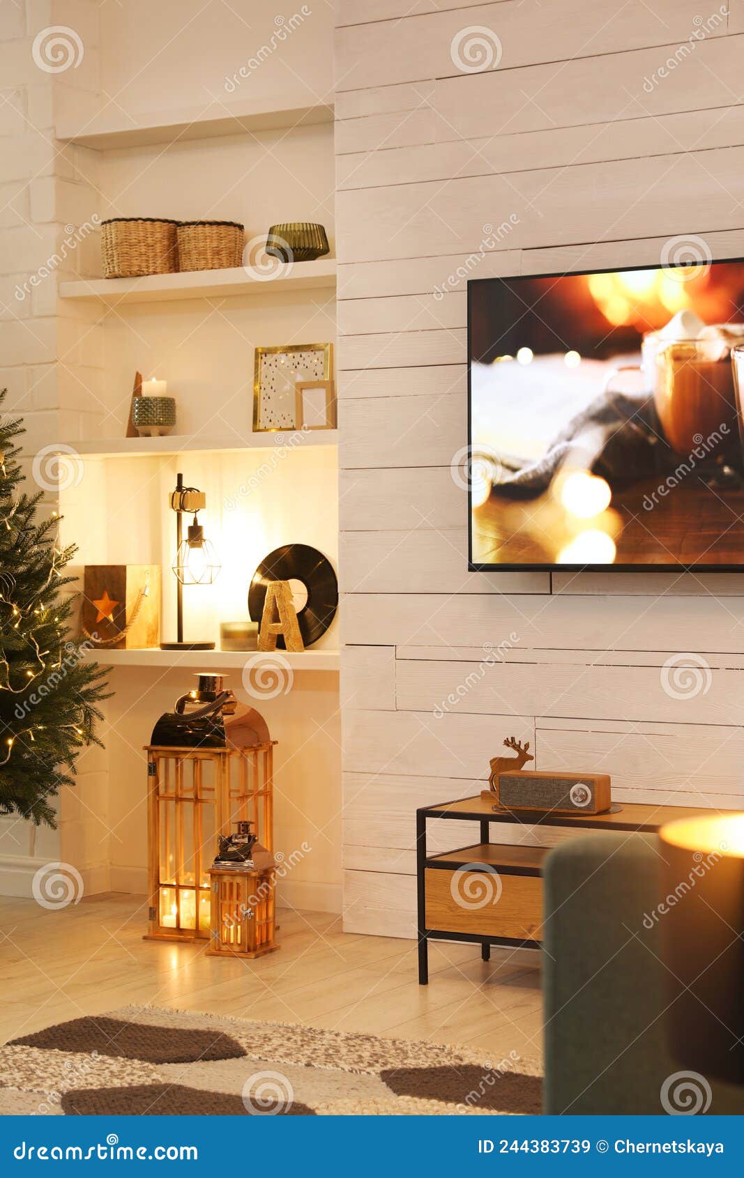 Plasma TV on White Wooden Wall in Living Room Beautifully Decorated for