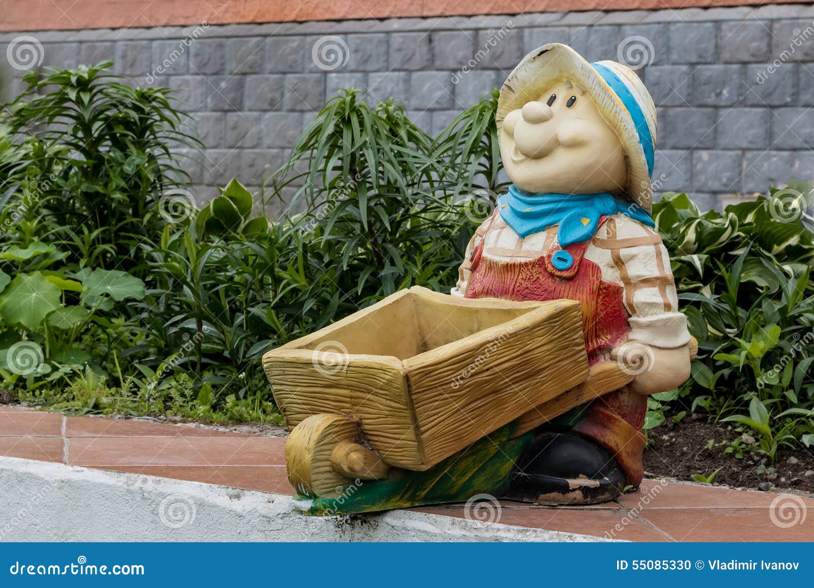 Plaster Sculptures of Assistants in a Garden Stock Photo Image of