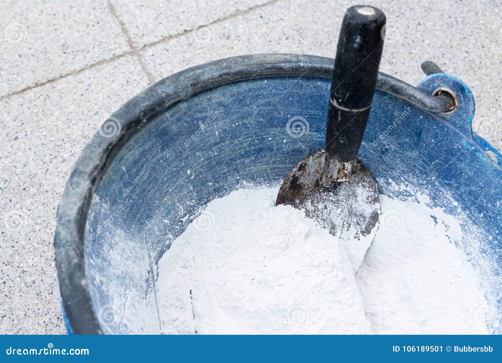 Plaster Trowel in the Plastic Construction Buckets on Construction Site
