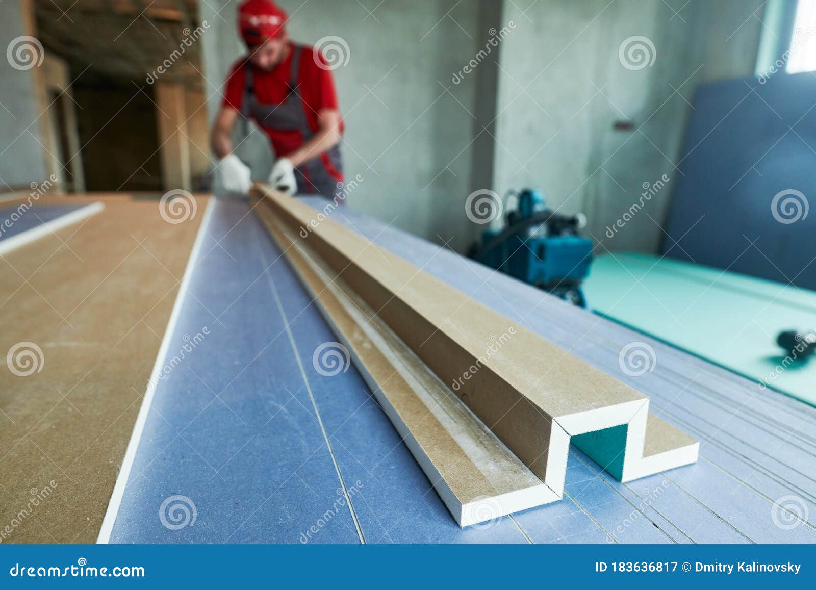 plasterboard work. worker assembling gypsum drywall construction