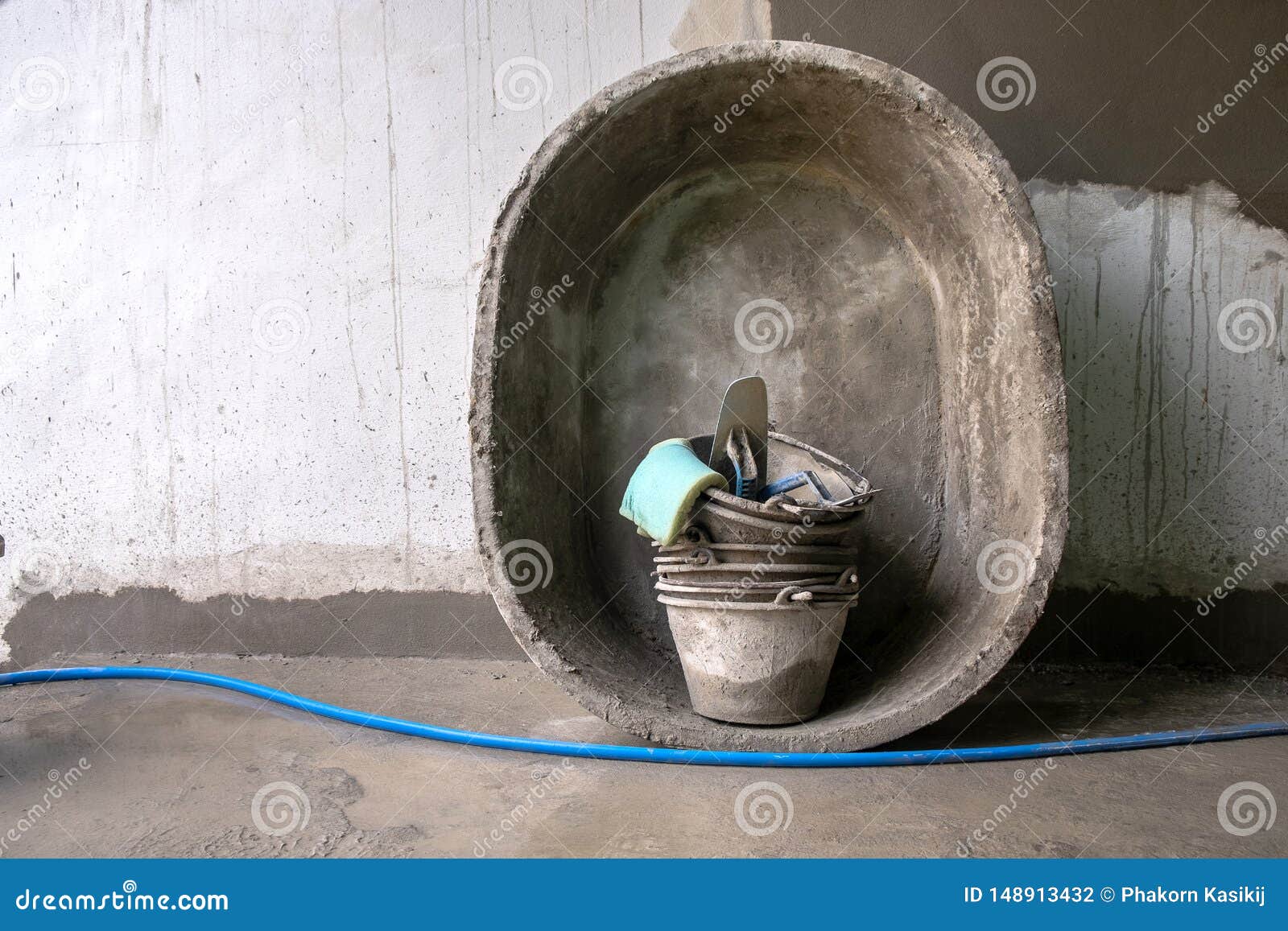 Plasterer Equipment in the New Building Work Site. Mortar Pan, Trowel