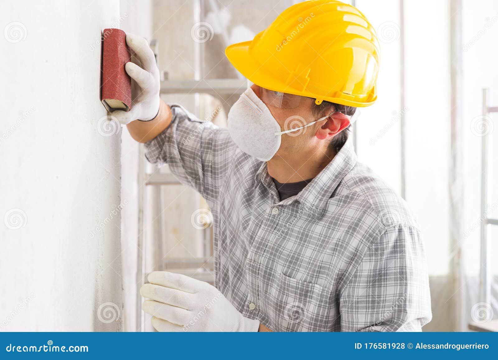 Plasterer or Painter Sanding a White Wall Stock Photo Image of craftsman, putty 176581928