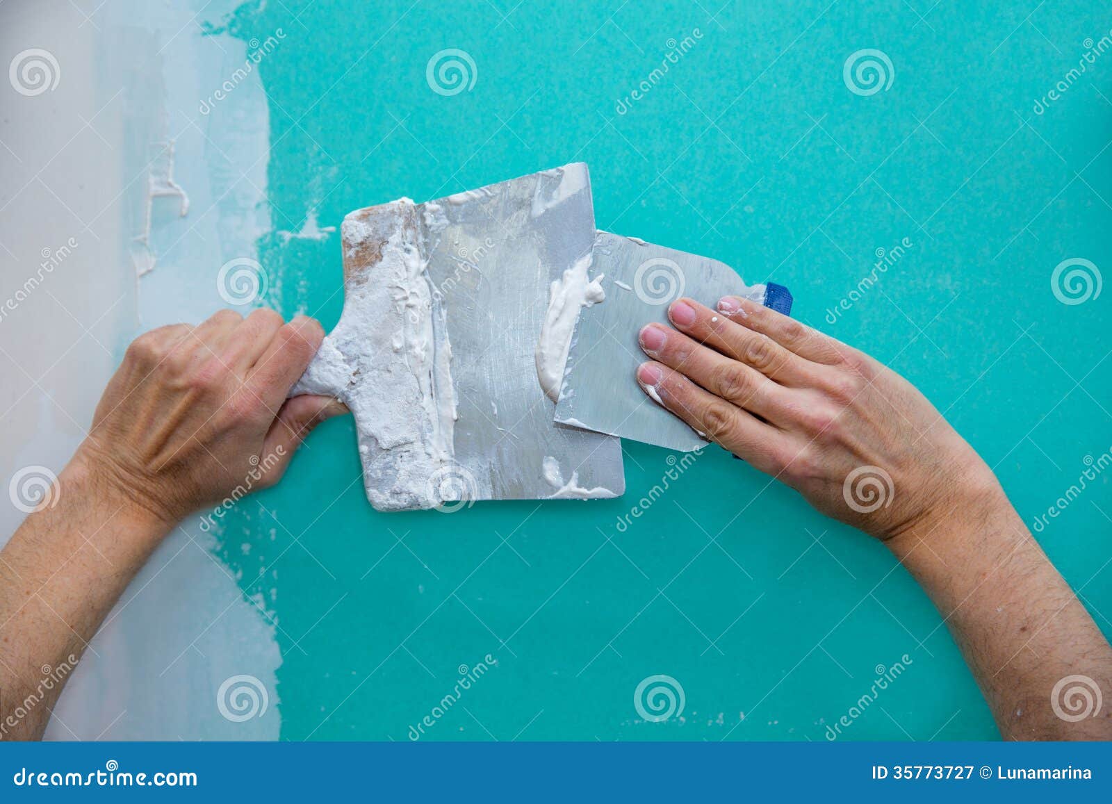 Plastering Man Hands with Plaste on Drywall Plasterboard Stock Image