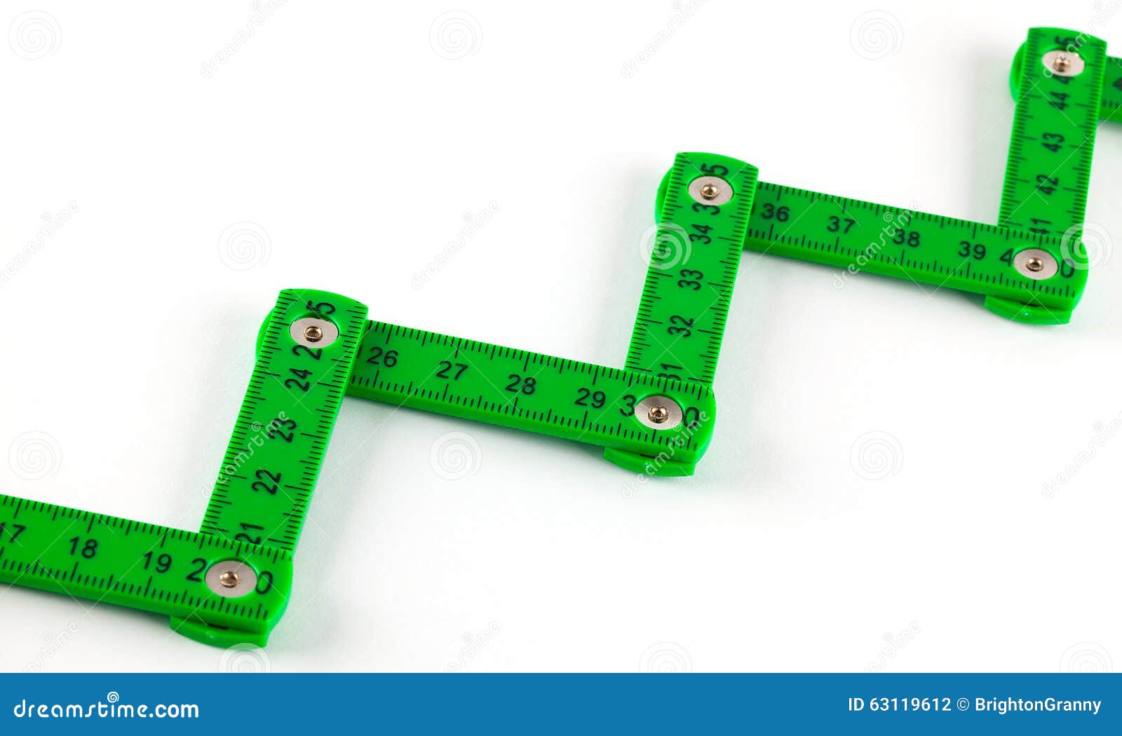plastic-articulated-ruler-closeup-green-