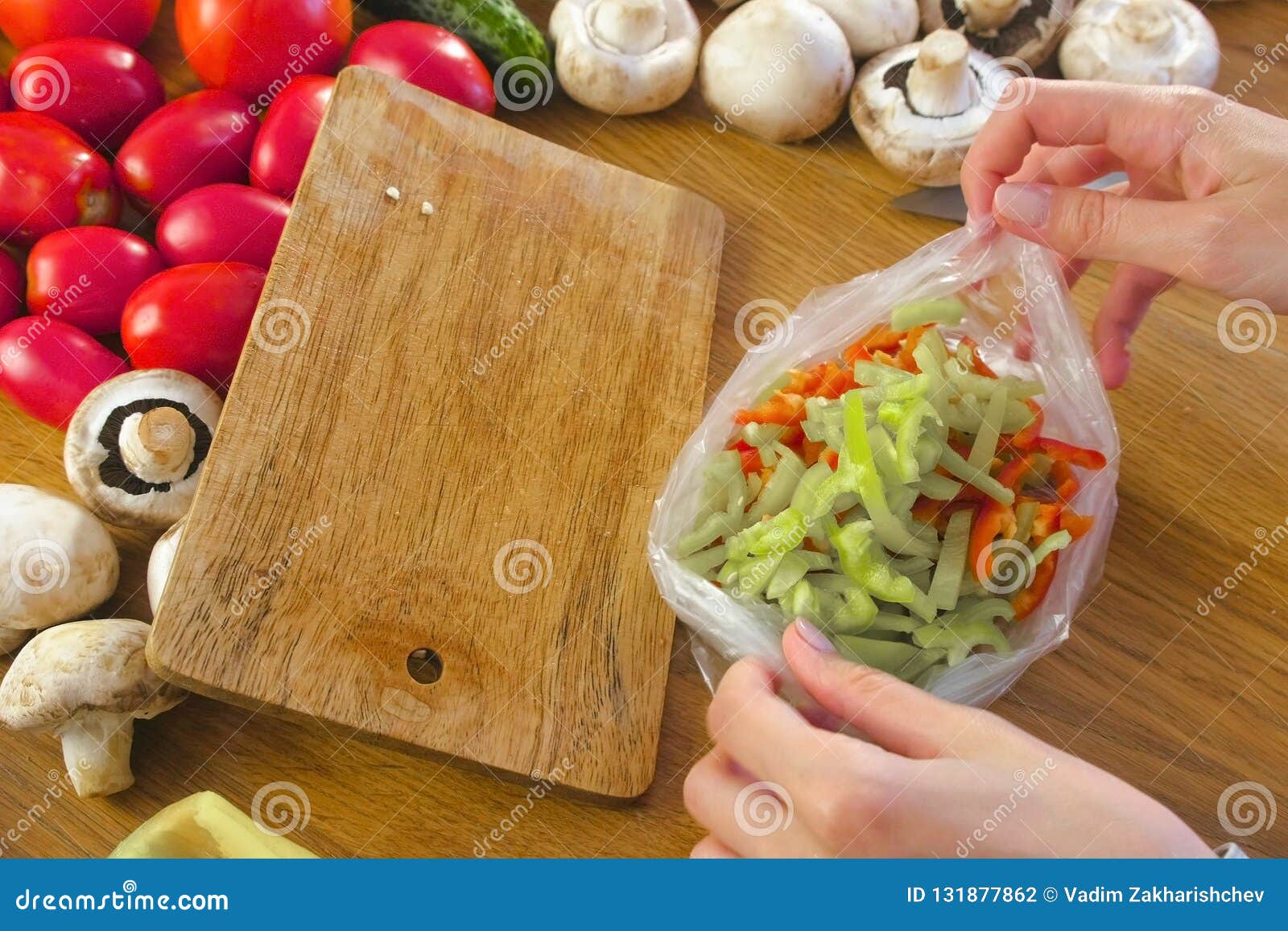 Plastic Bag for Freezing Pepper in a Bag on Kitchen Table. Stock Photo