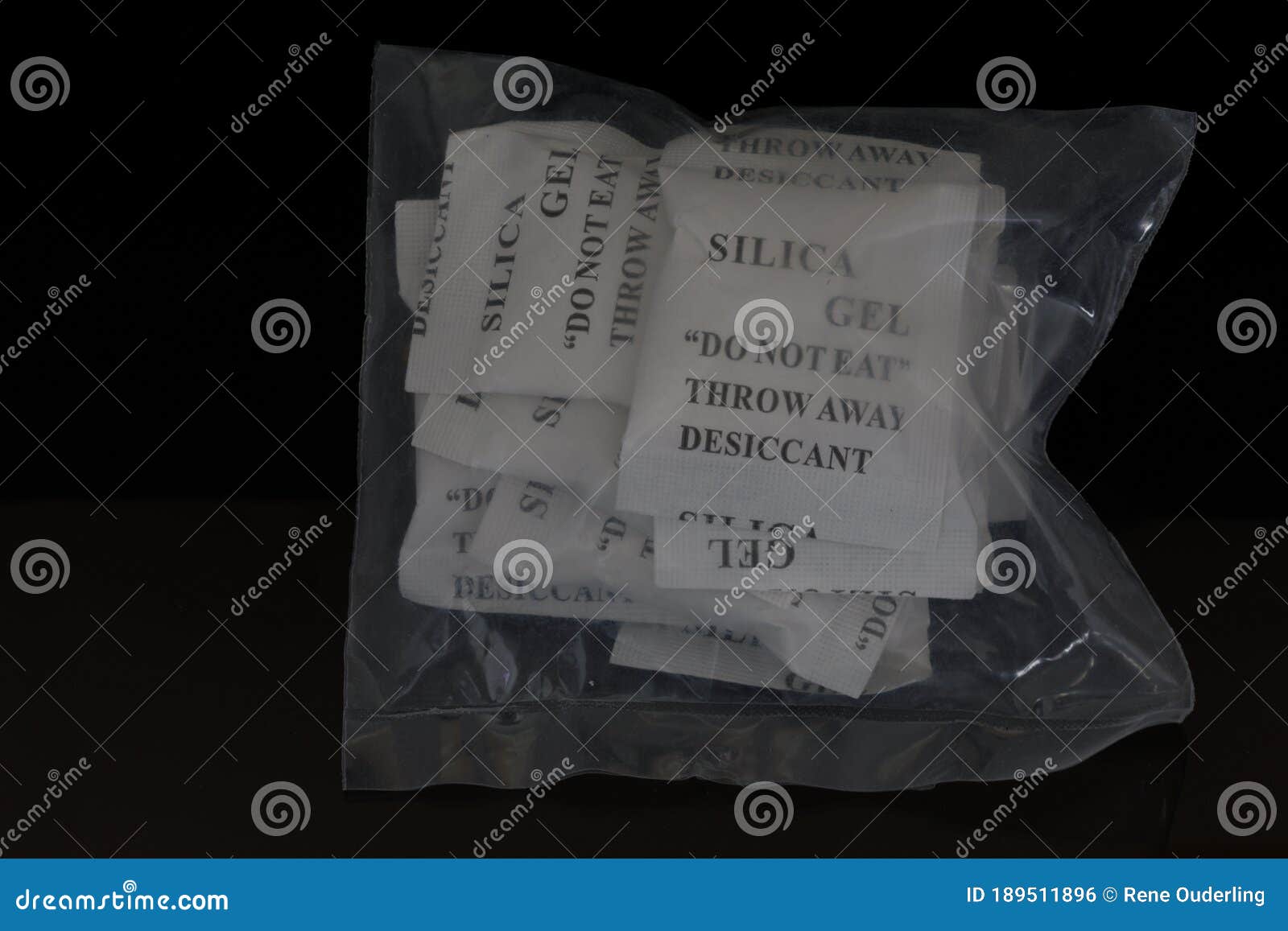 Plastic Bag with Silica Gel Sachets or Packets with Black Text Stock