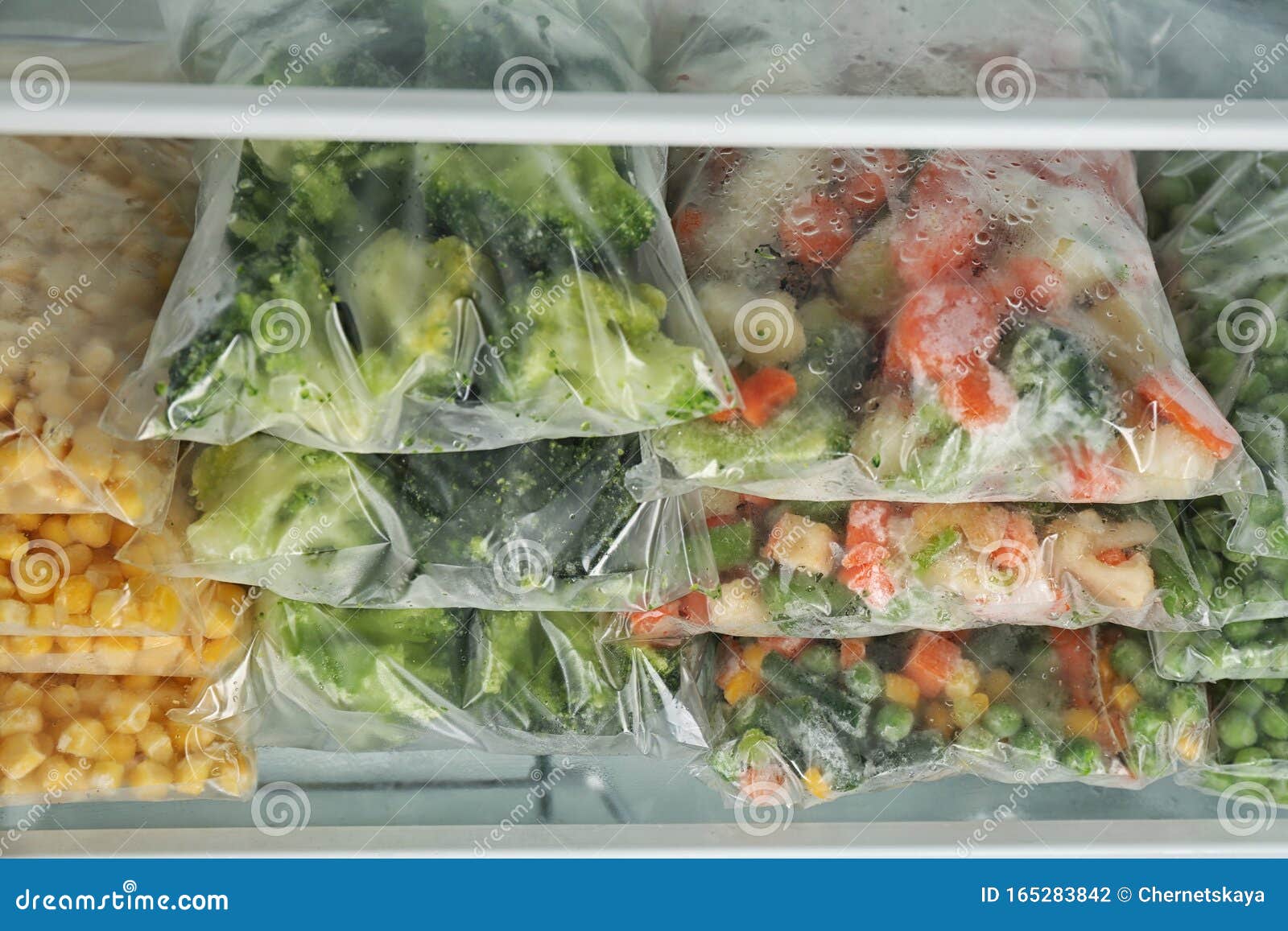 Plastic Bags with Frozen Vegetables in Refrigerator Stock Photo Image of healthy, food 165283842