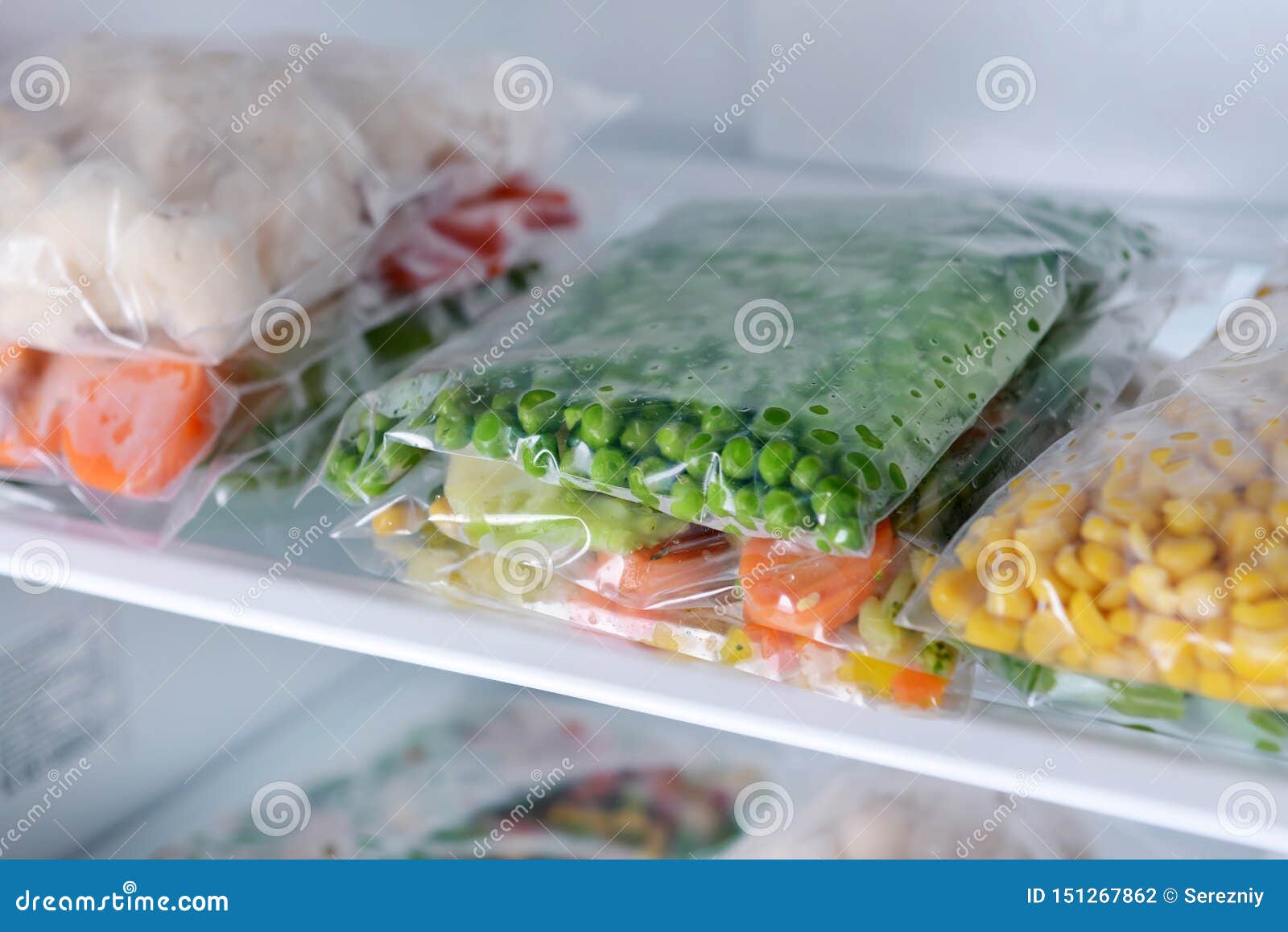 Plastic Bags with Frozen Vegetables in Refrigerator Stock Photo Image of freeze, closeup