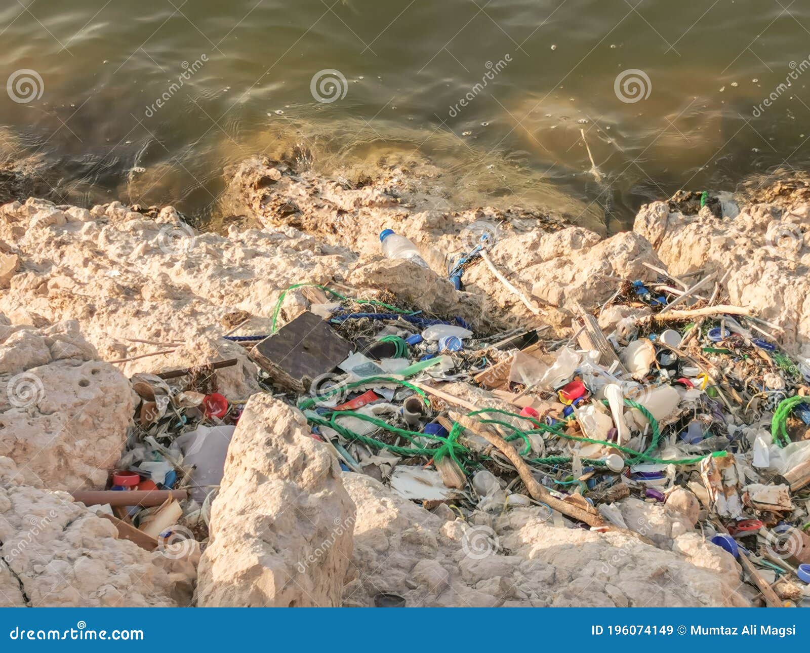 Of Plastic Bags and Pollution on the Beach of Karachi City Stock Image