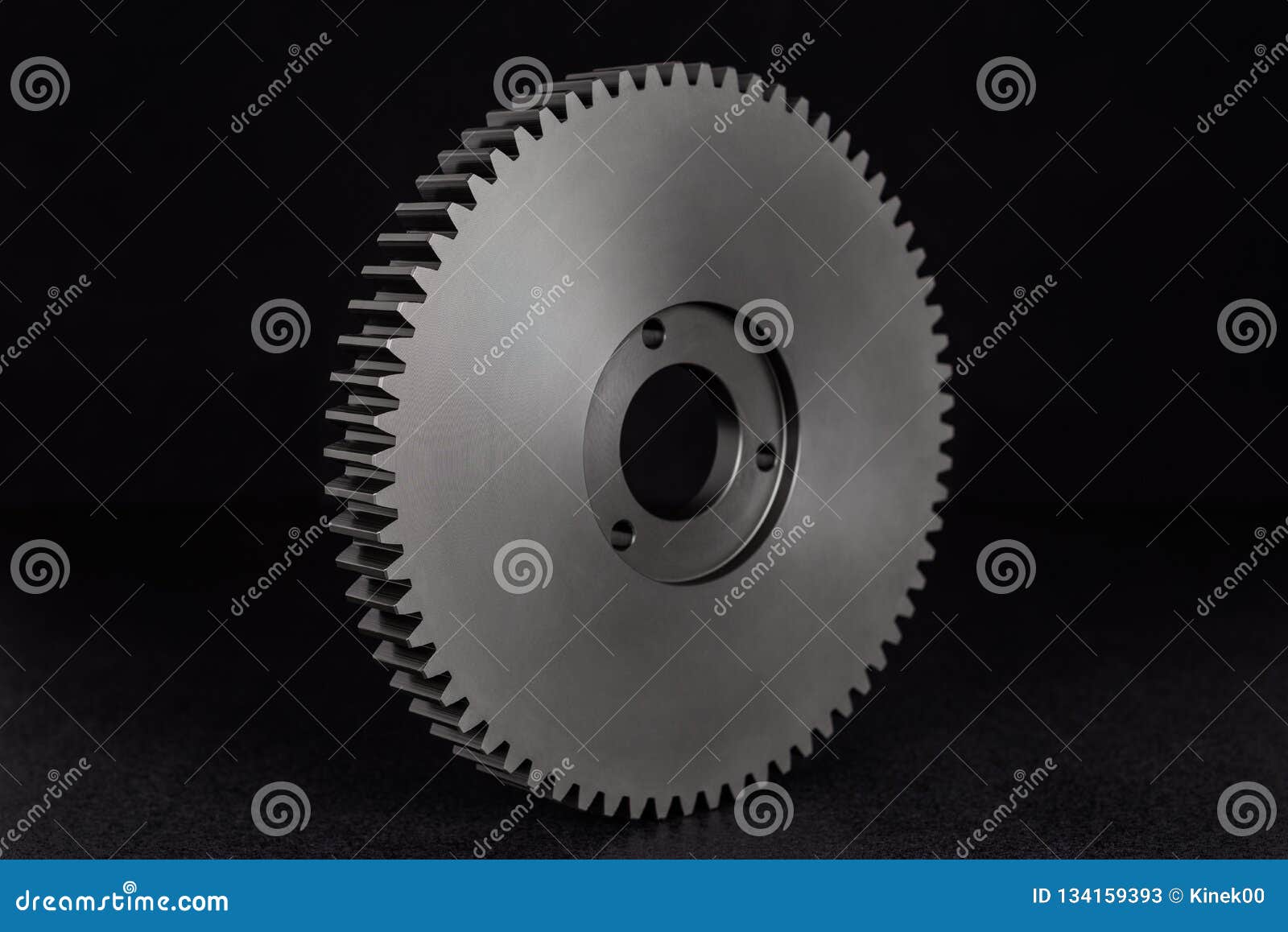 Plastic, Black Gear with 68 Sprockets, Isolated on a Black Background