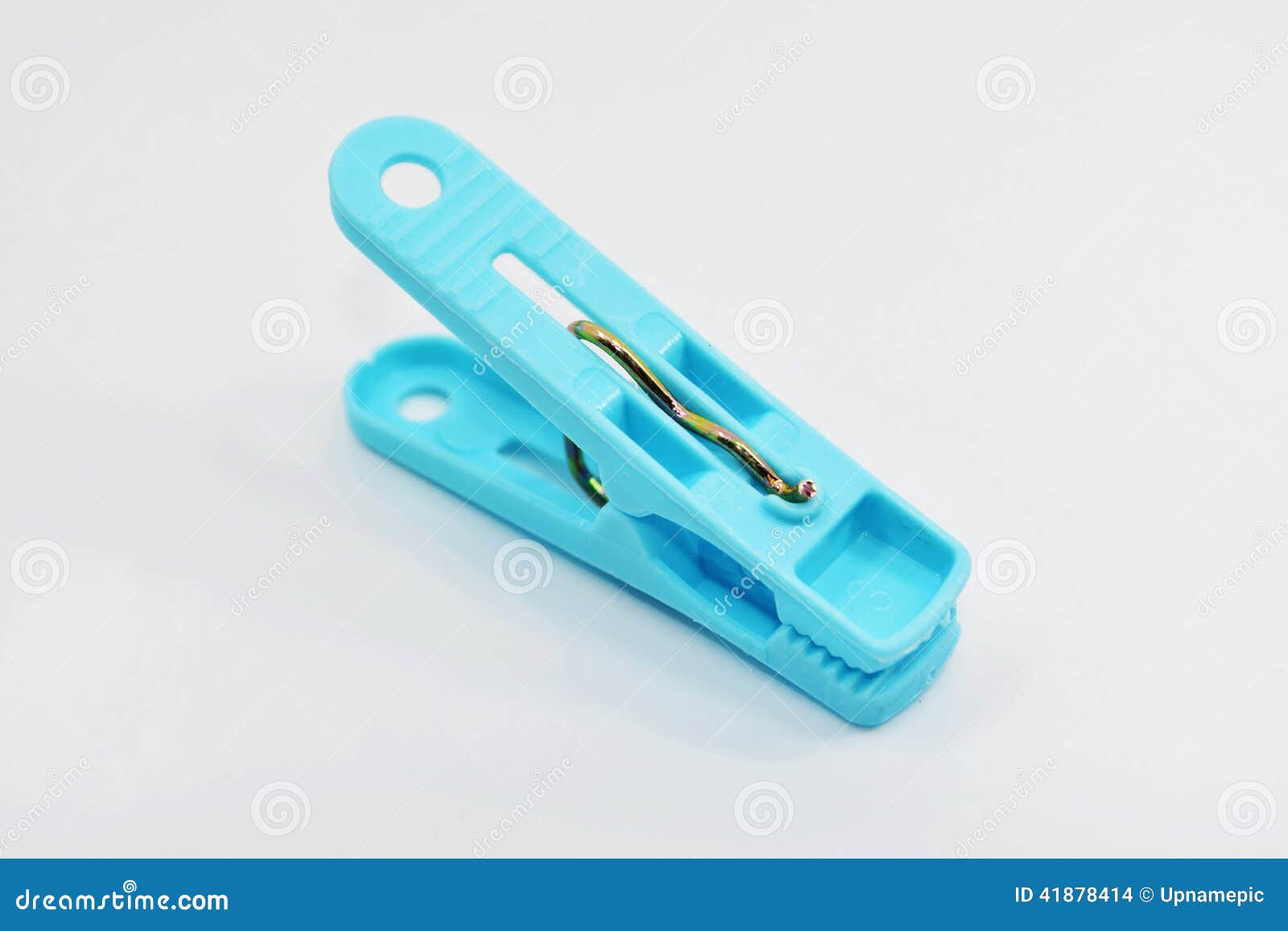 Plastic Blue Clothespins Isolated on White Background. Stock Photo
