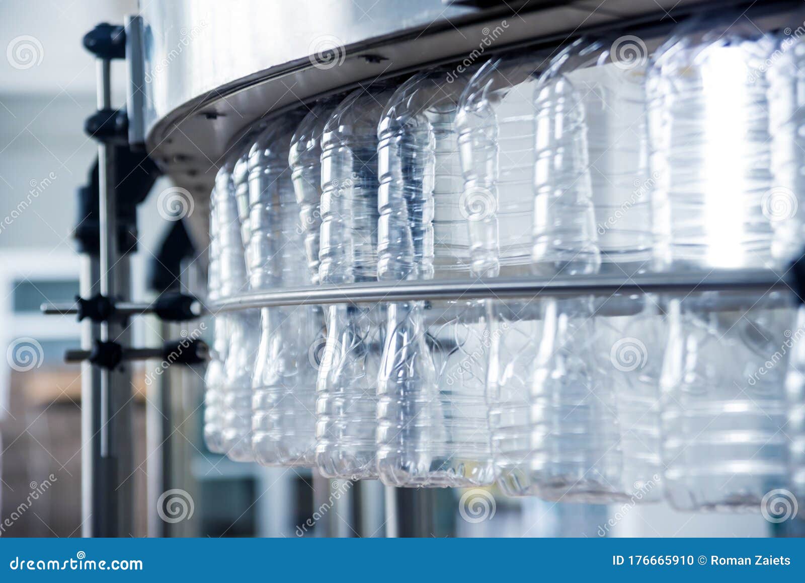 The Plastic Bottle Blowing Machine. PET Preforms for Blowing of Plastic