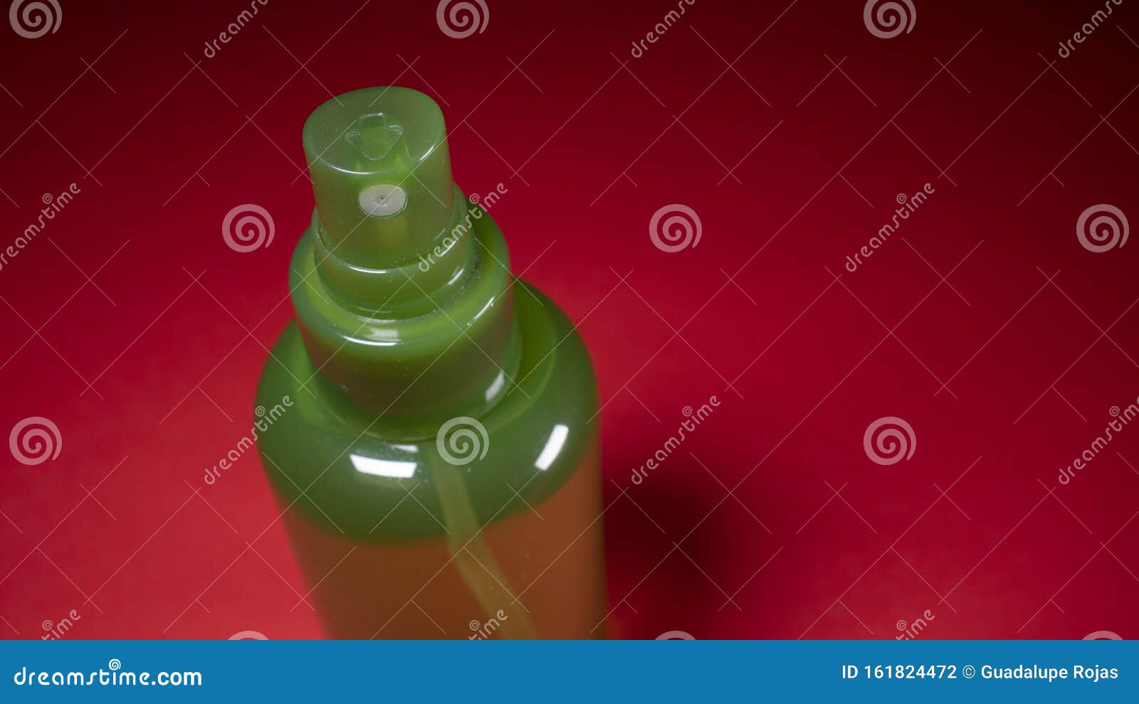plastic bottle filled with red background