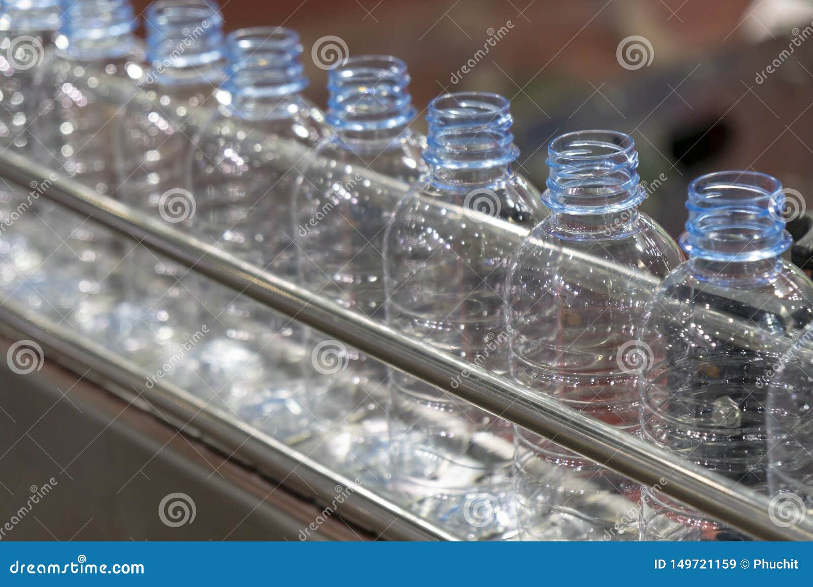 The Plastic Bottles in the Conveyor Belt. Stock Image Image of