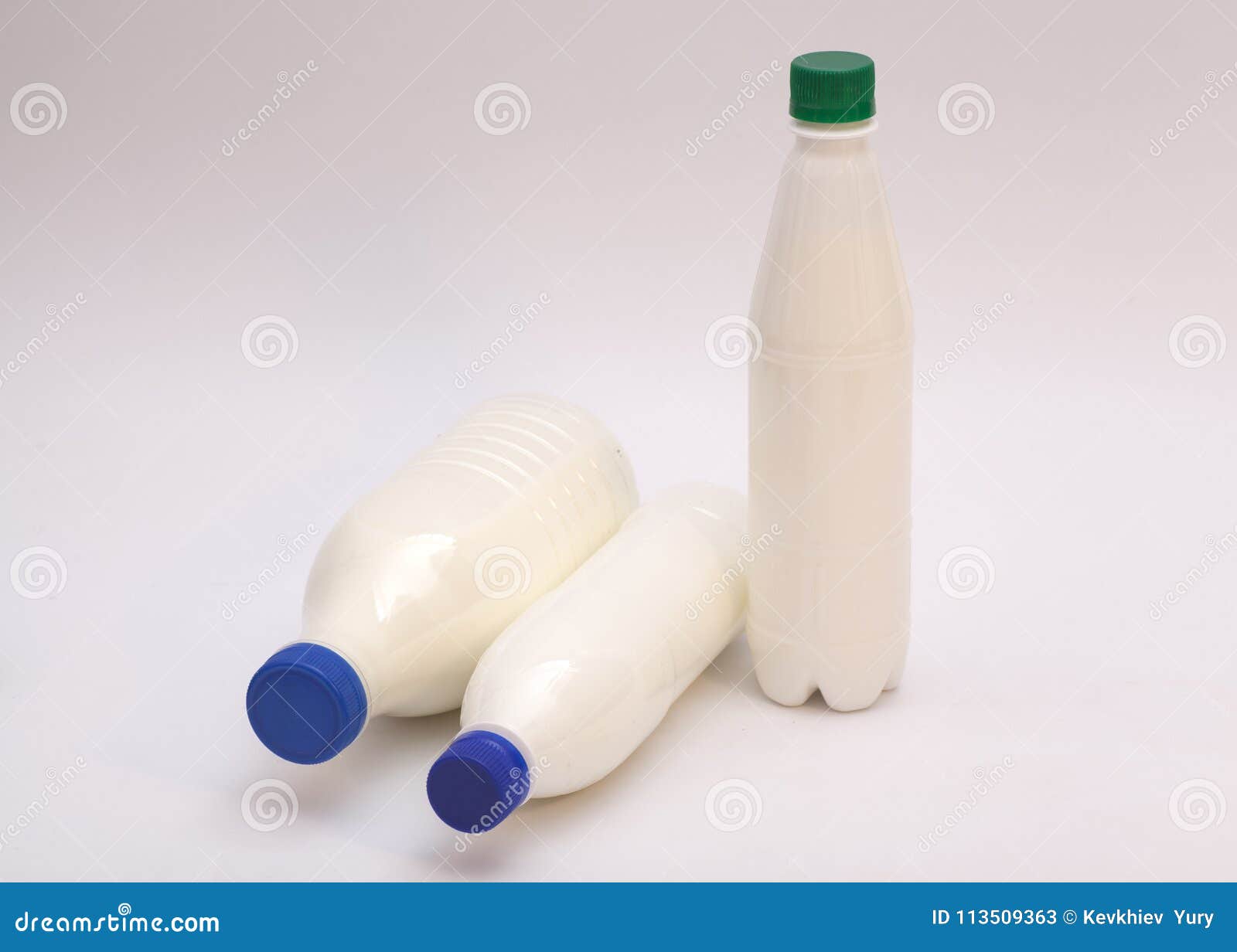 Plastic Bottles of milk stock image. Image of glass 113509363