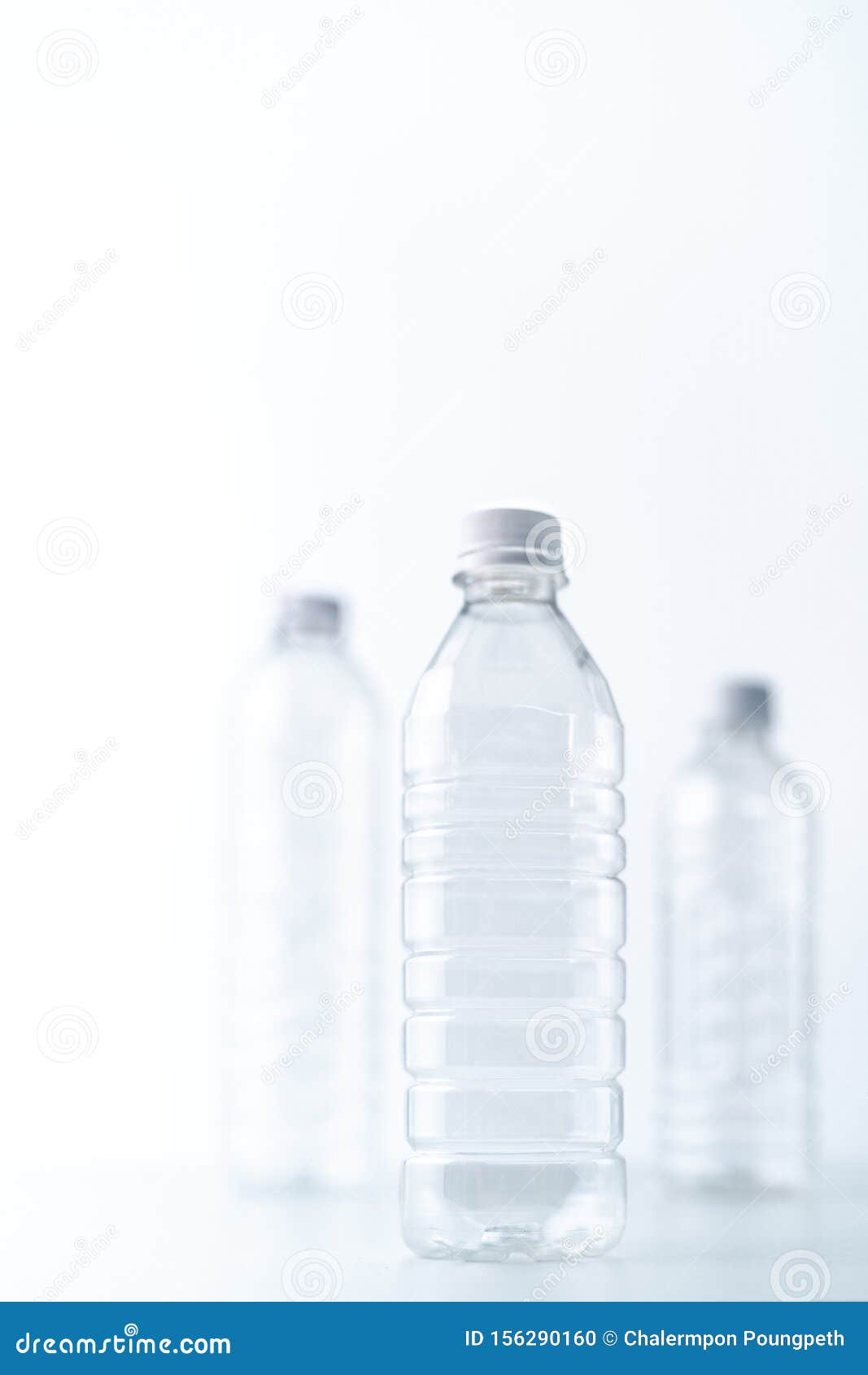 Plastic Bottles in Various Shapes and Sizes on White Table and