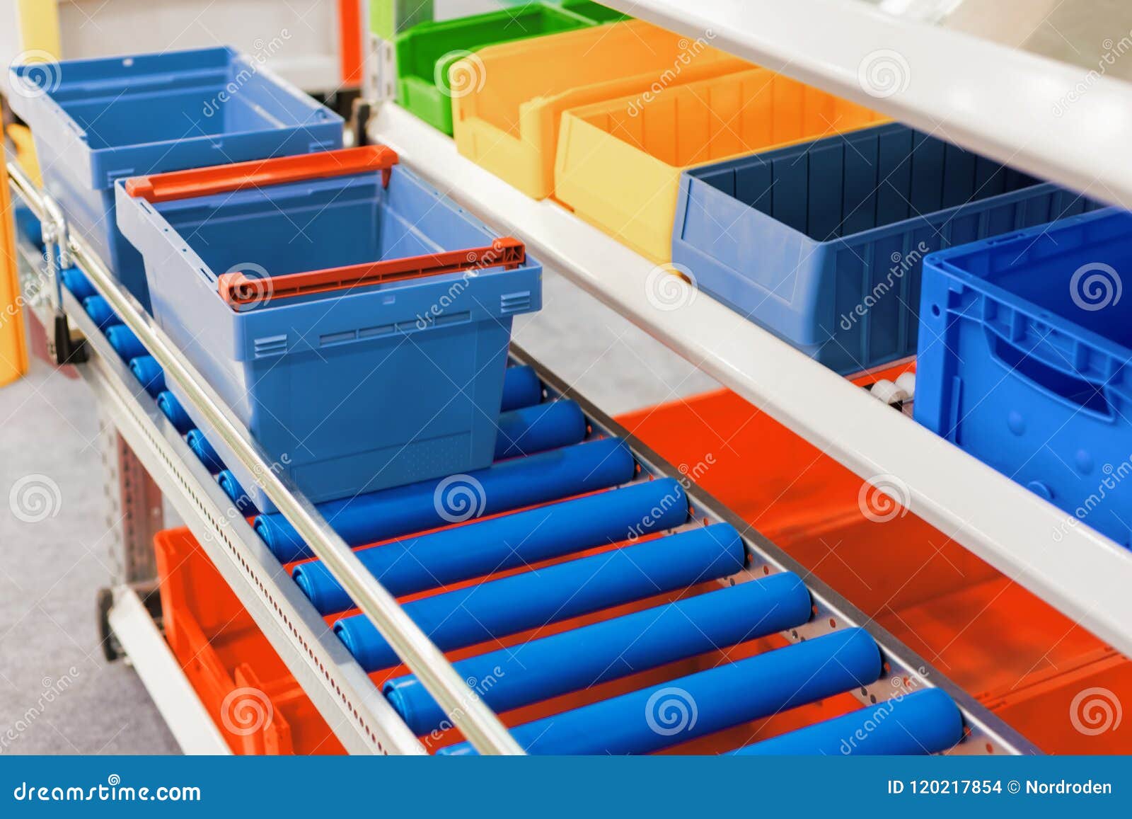 Plastic Boxes on the Roller Conveyor. Stock Photo Image of industry